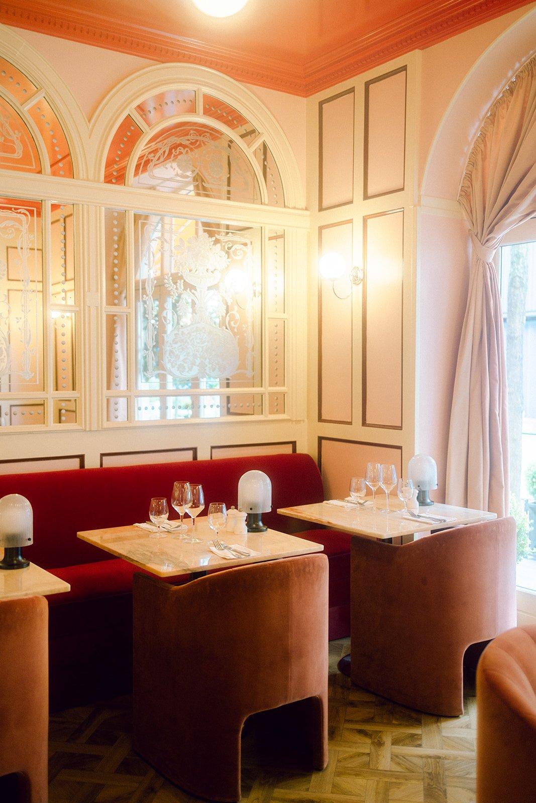 Same sex lgbtq+ couple in cafe hotel on their wedding day in denmark bella grand.jpg