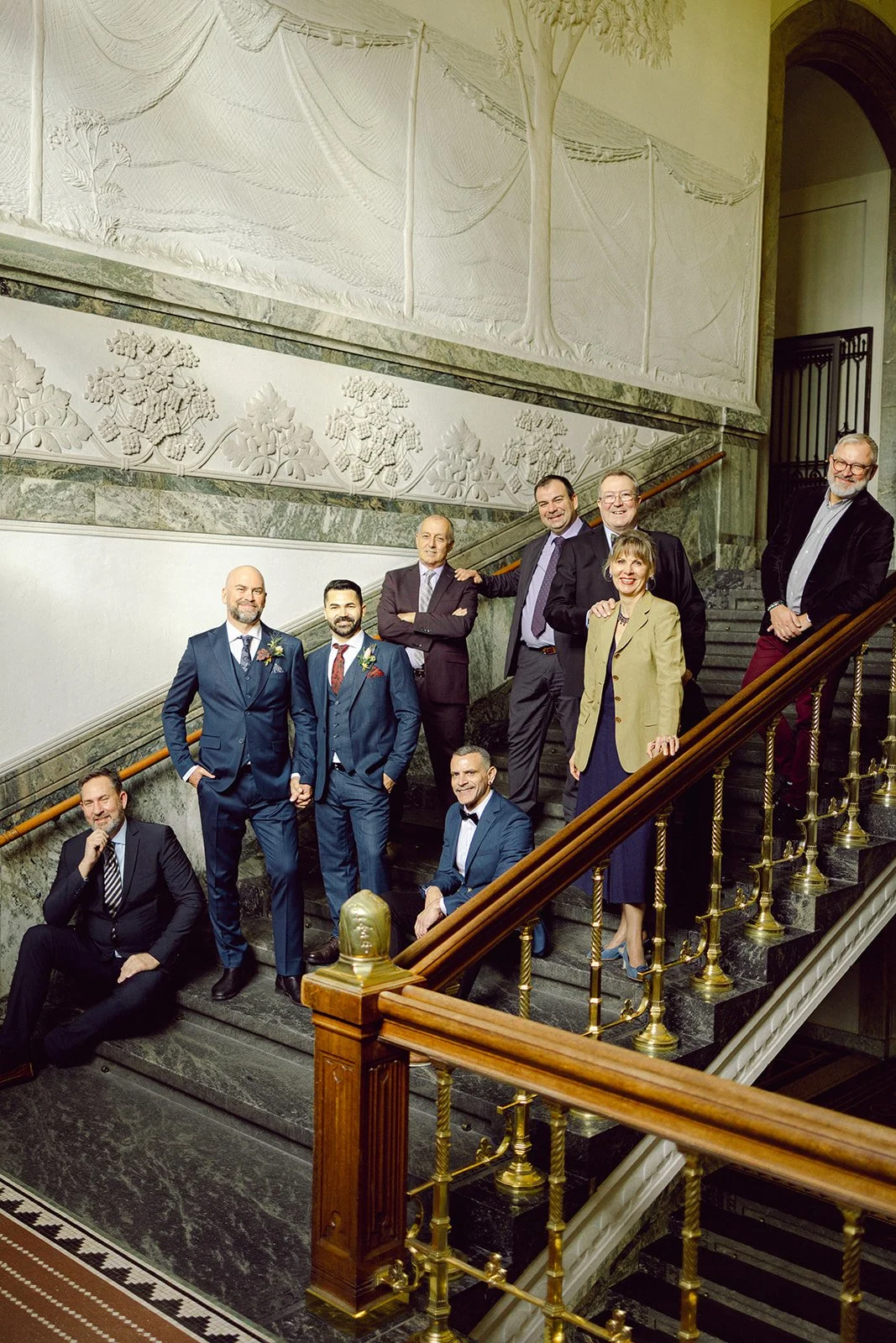 same sex LGBTQ+ exiting copenhagen city hall after getting married in denmark group photo guest.jpg
