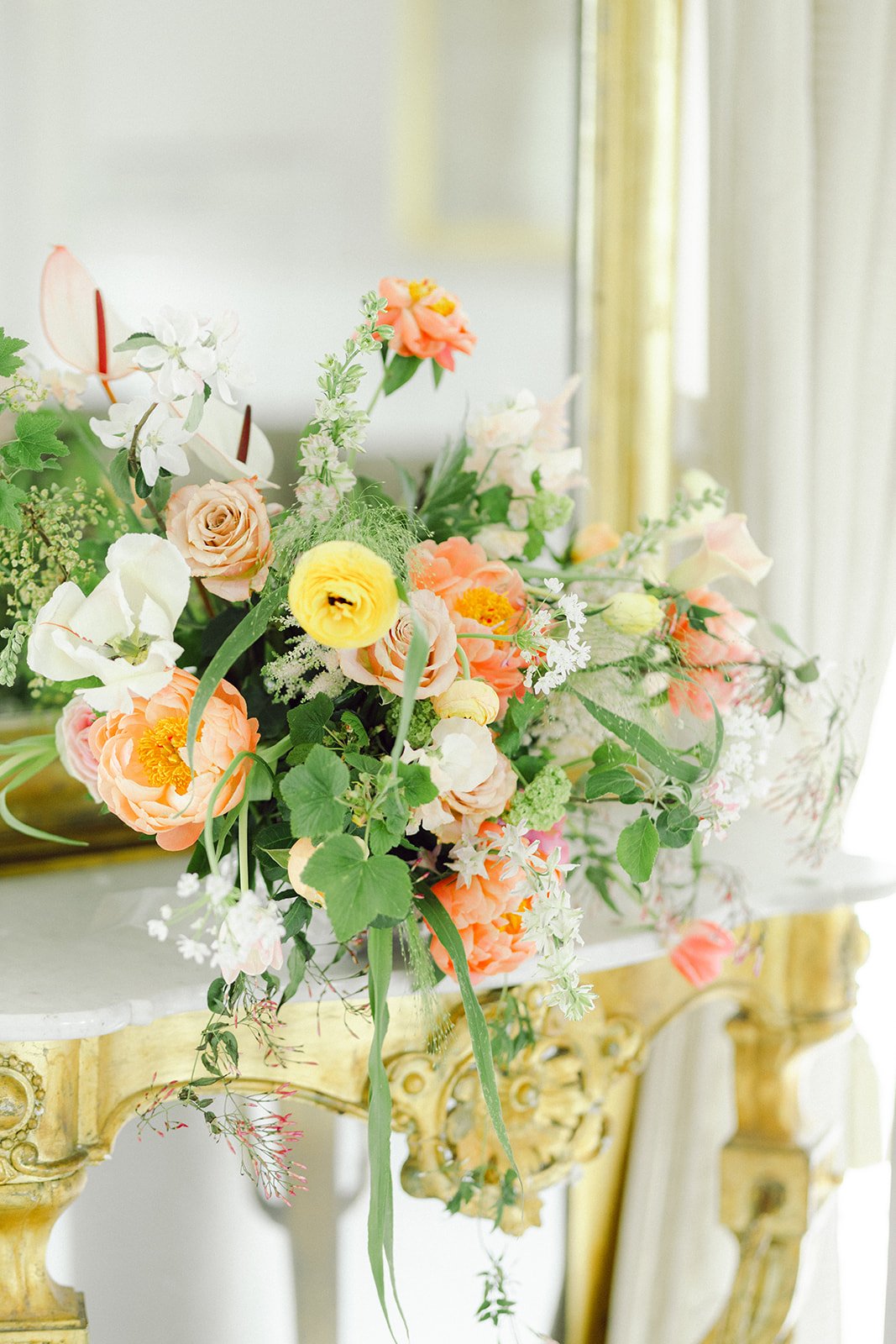 Close-up of a bridal bouquet with garden roses and seasonal flowers at a Danish luxury wedding at Kokkedal Slot