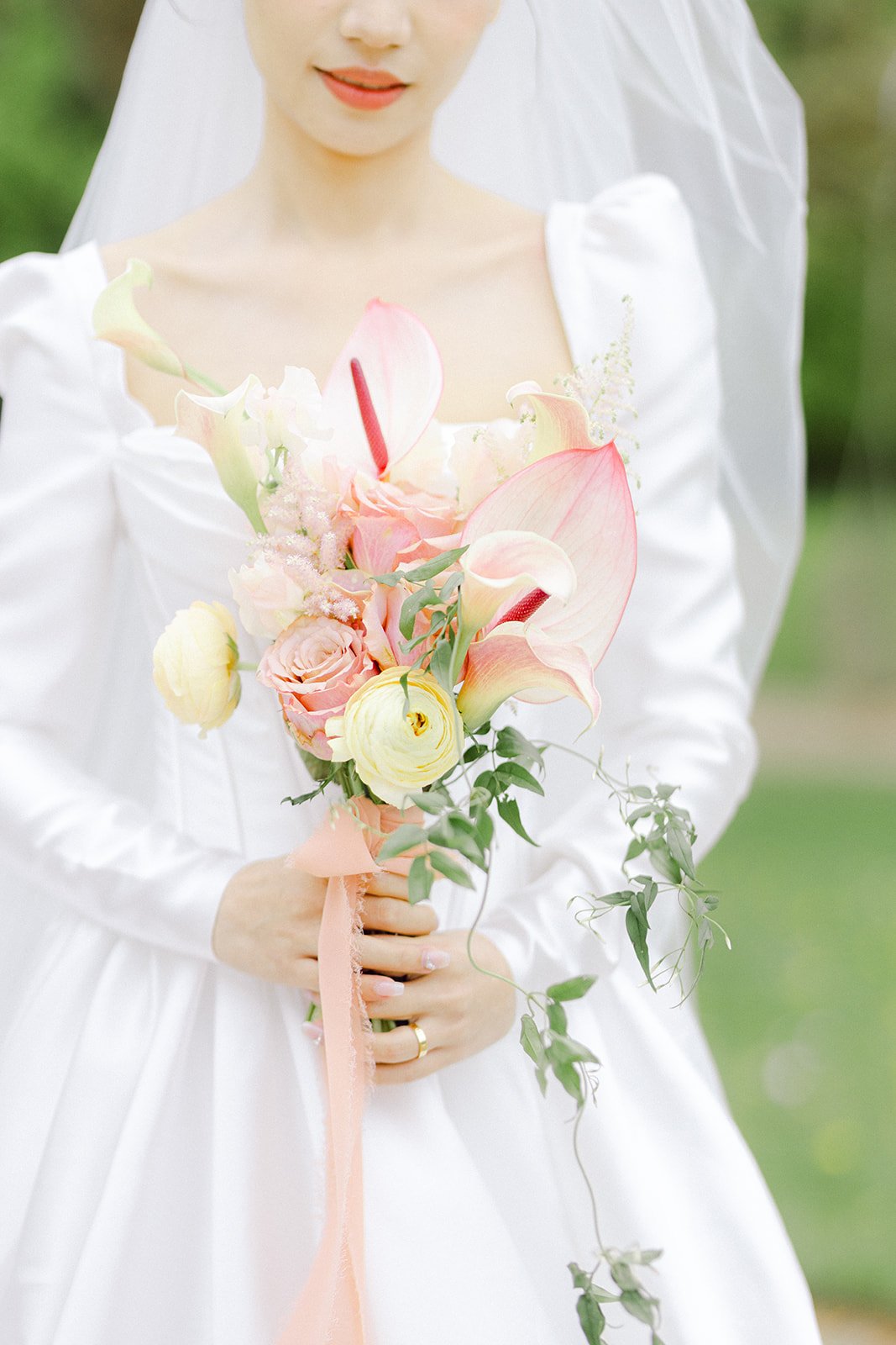 Close-up of a bridal bouquet with garden roses and seasonal flowers at a Danish luxury wedding at Kokkedal Slot boutoniere bespoke editorial