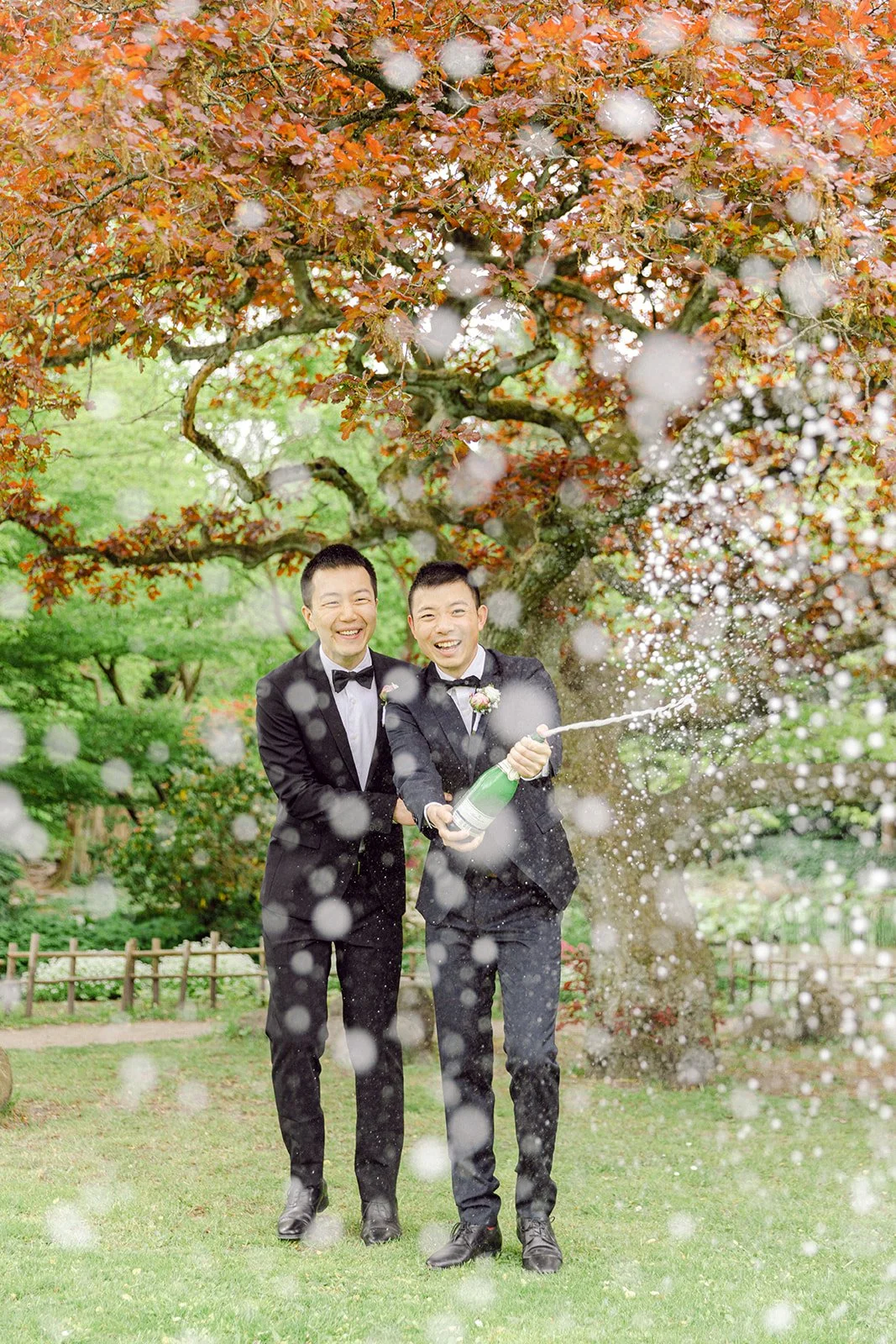 copenhagen city hall wedding same sex couple denmark wedding photographer champagne splash