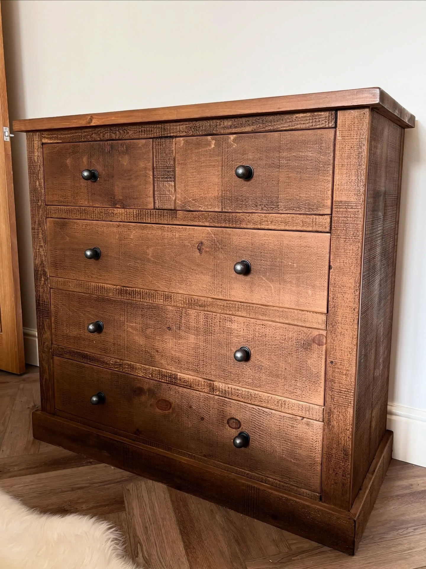A classic.

Just delivered this 2 over 3 rough sawn chest of drawers.

Finished in our medium wax and complete with mental handles.