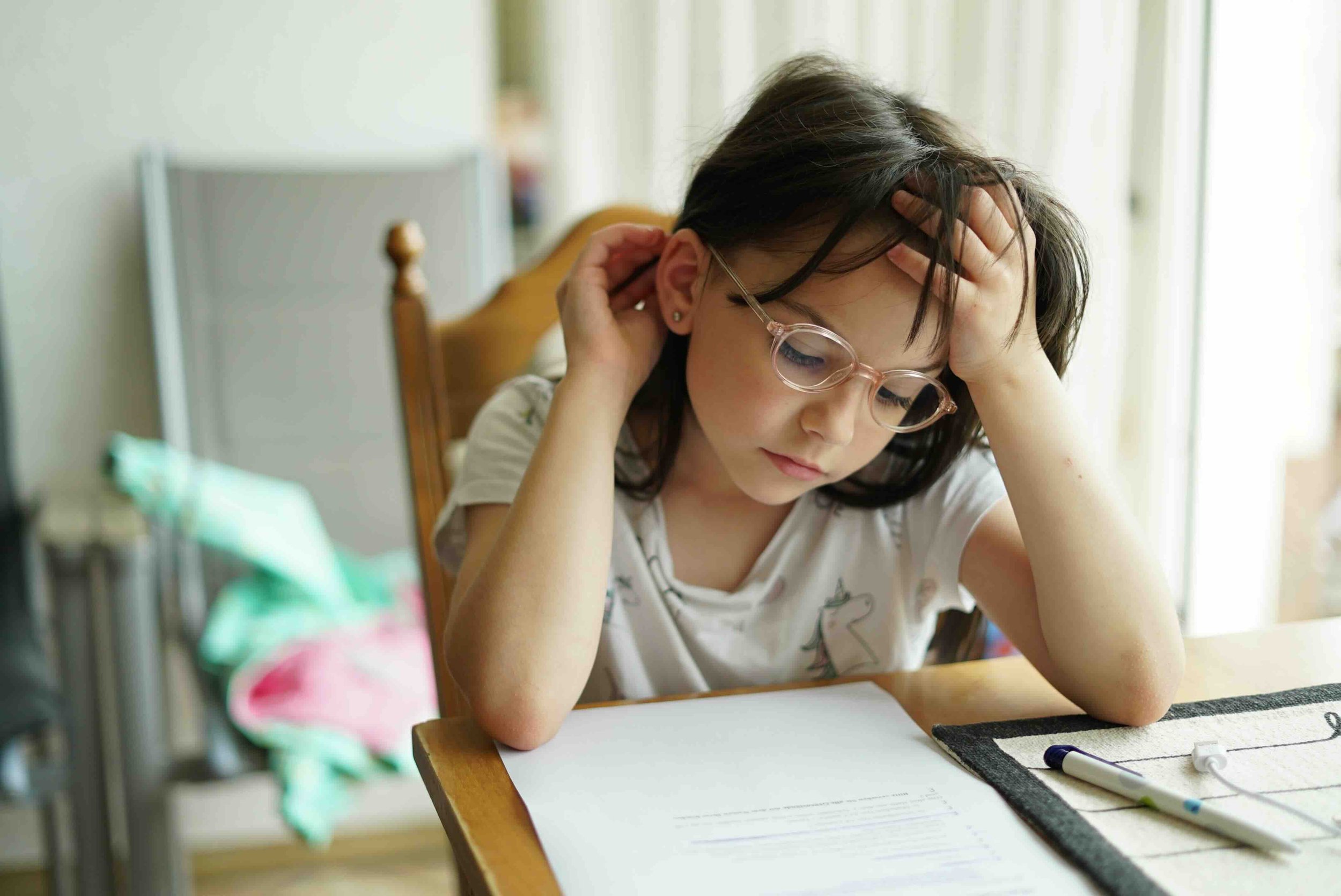 Primary school girl doing homework