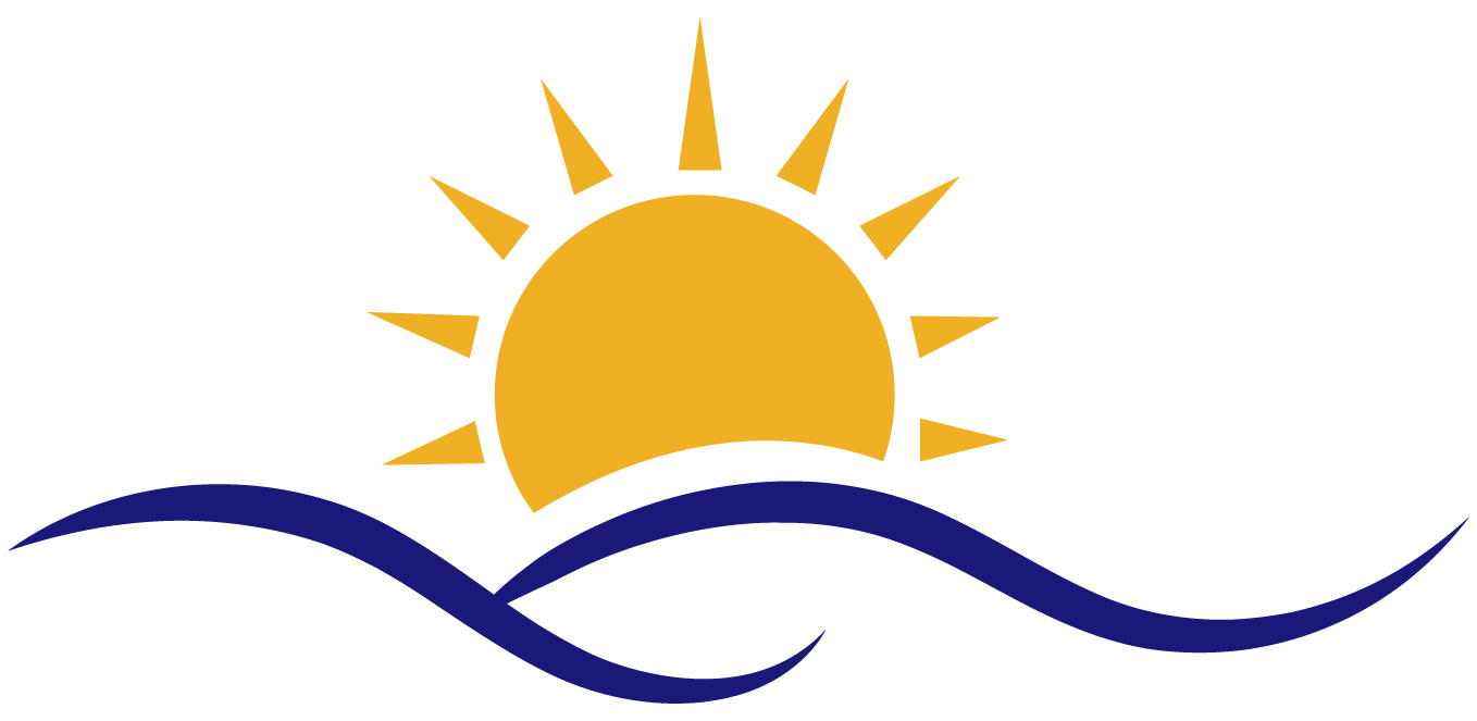 Sun rising over blue waves.