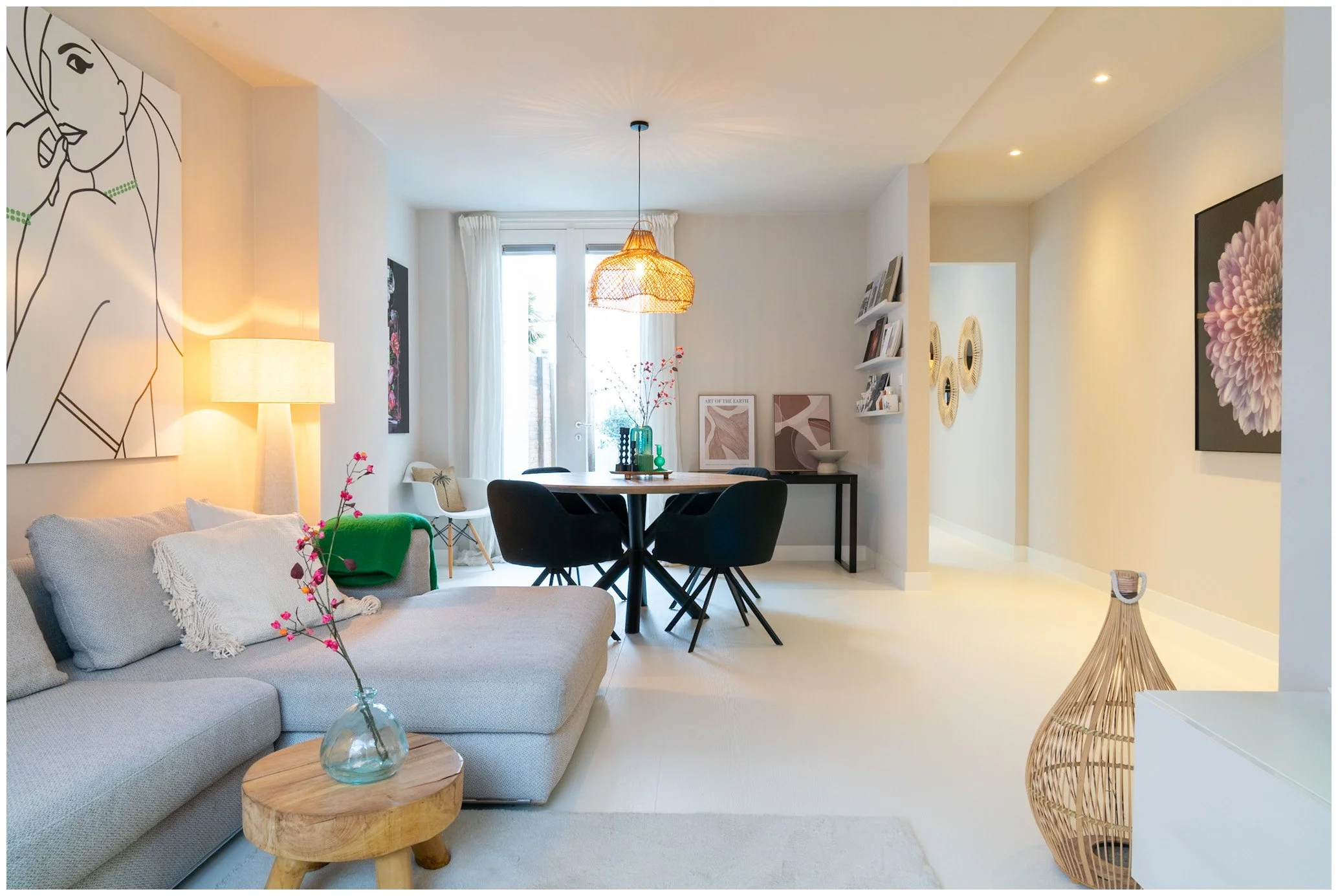 Bright and spacious living room with dining area at Stay in Breda