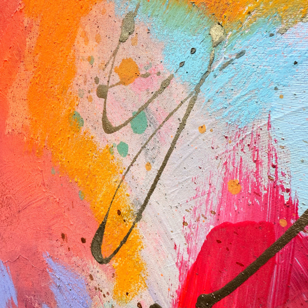 Nahaufnahme in bunten Farben, wie rosa, hellblau, orange und pink, Farbspritzer in silber als Akzent