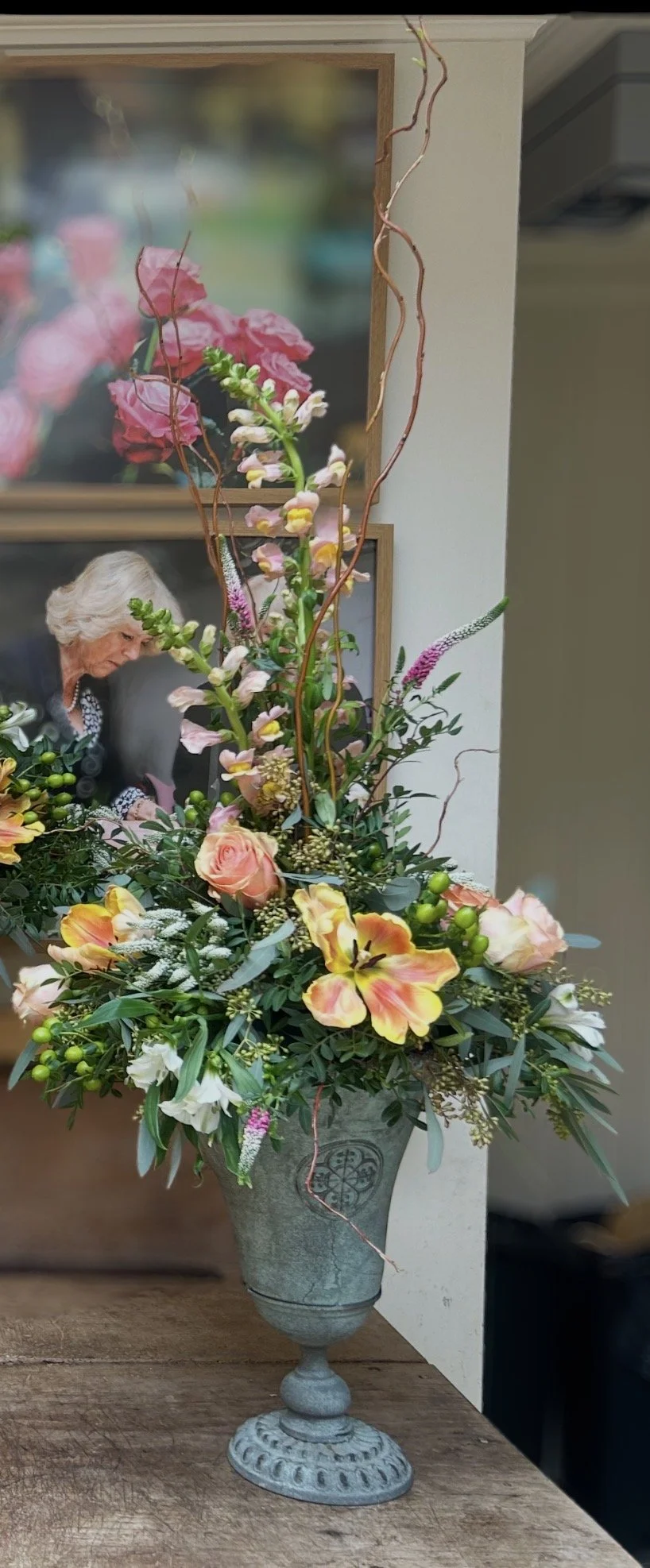 Inspired by the natural movement of a classic English garden, this sculptural pedestal arrangement showcases the delicate balance of Heirloom Plume and Petal’s signature style.