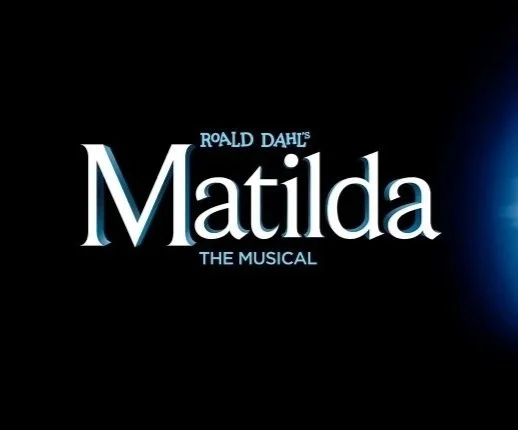 Title card for Roald Dahl's Matilda the Musical with black background and blue gradient on the right