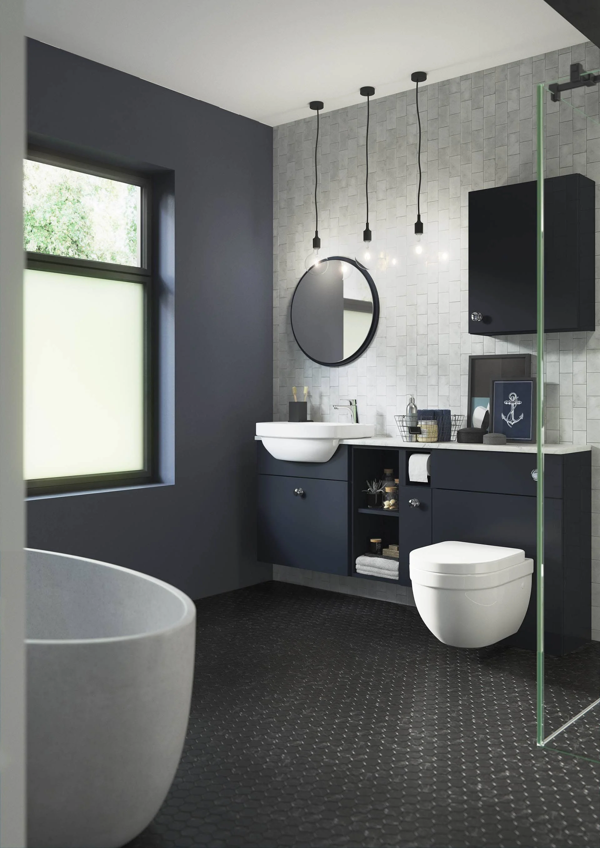 Modern bathroom with dark blue cabinets, a white sink, a toilet, black pendant lights, a round mirror, and a window with frosted glass.