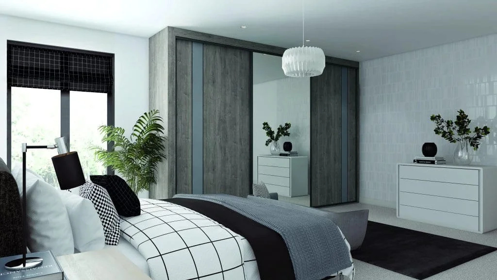 Modern bedroom with a bed, black and white bedding, large window, plants, dresser, mirror, and decorative items, featuring minimalist design and neutral colors.