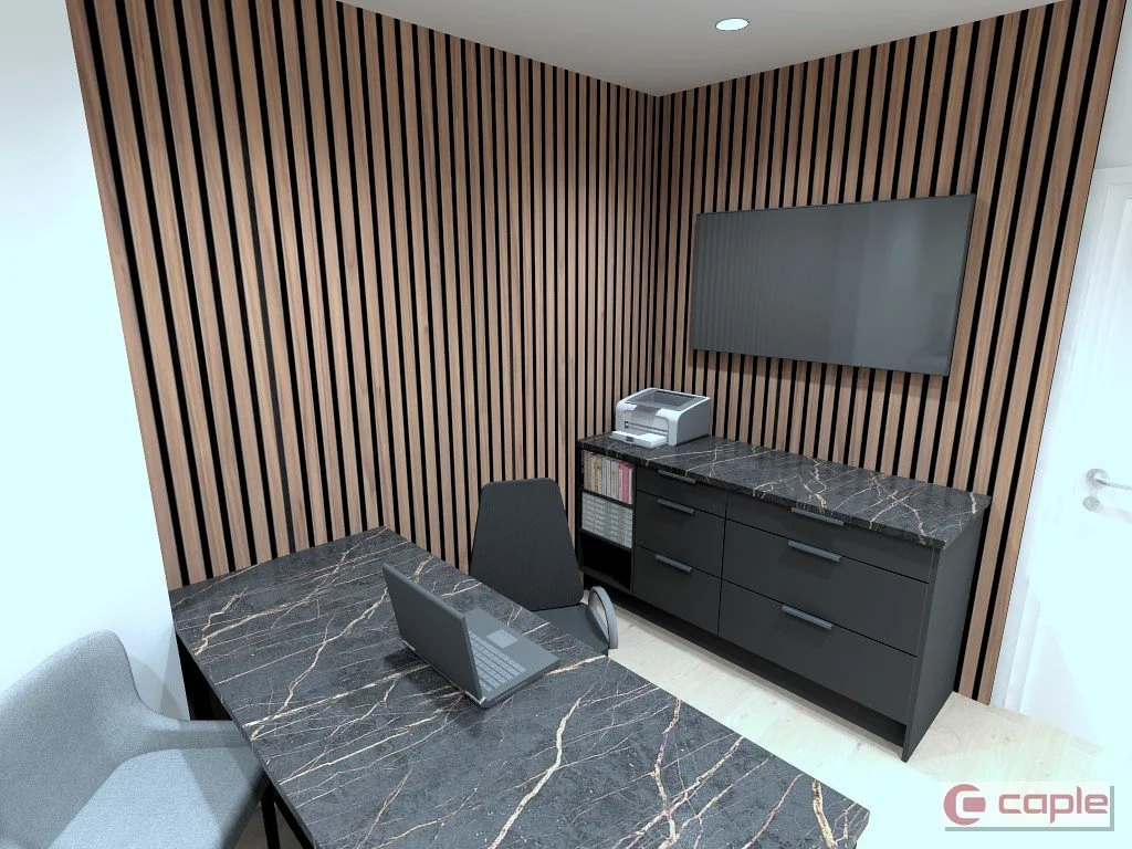 Office meeting room with a marble top table, two chairs, a black cabinet with a marble top, a wall-mounted flat-screen TV, a printer, and a laptop.