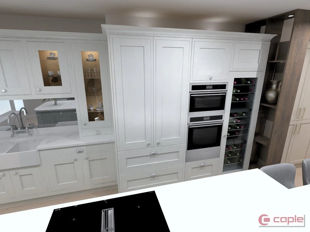 A modern kitchen with white cabinetry, a built-in wall oven, a wine rack, and a sink with a faucet. There are decorative dishes and glasses displayed in glass-front cabinets. The kitchen has a neutral color palette with wood accents.