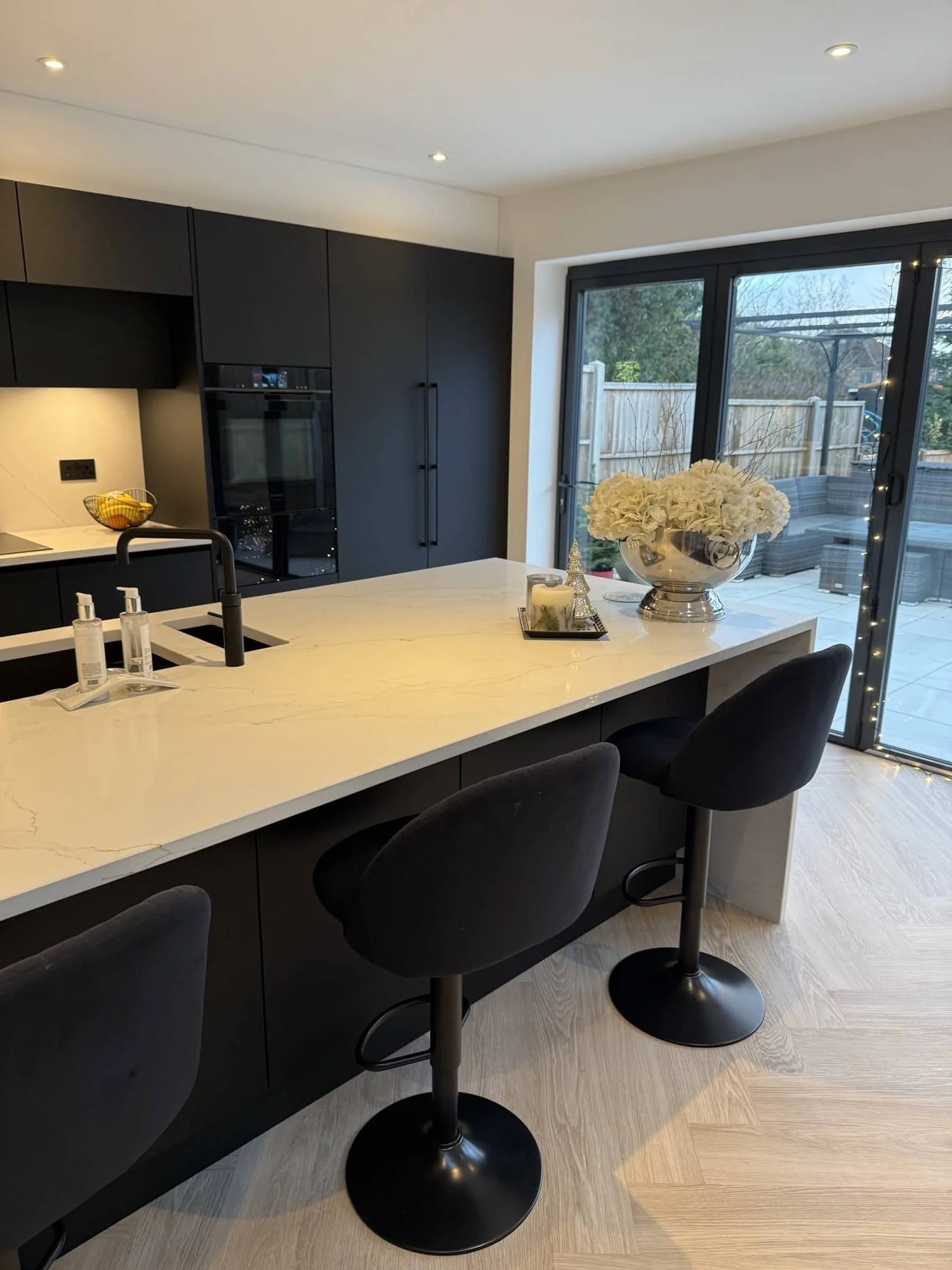 Matt black handleless kitchen in Solihull