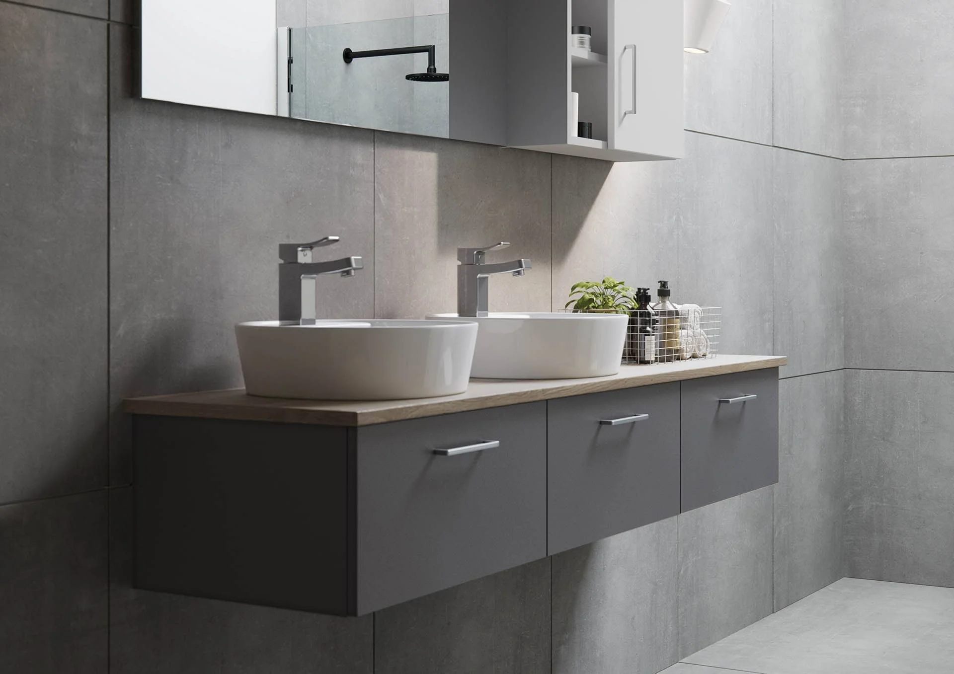 Modern bathroom with a gray floating vanity, two white vessel sinks, and a large mirror. Small cabinet with open shelves and a potted plant on the counter.