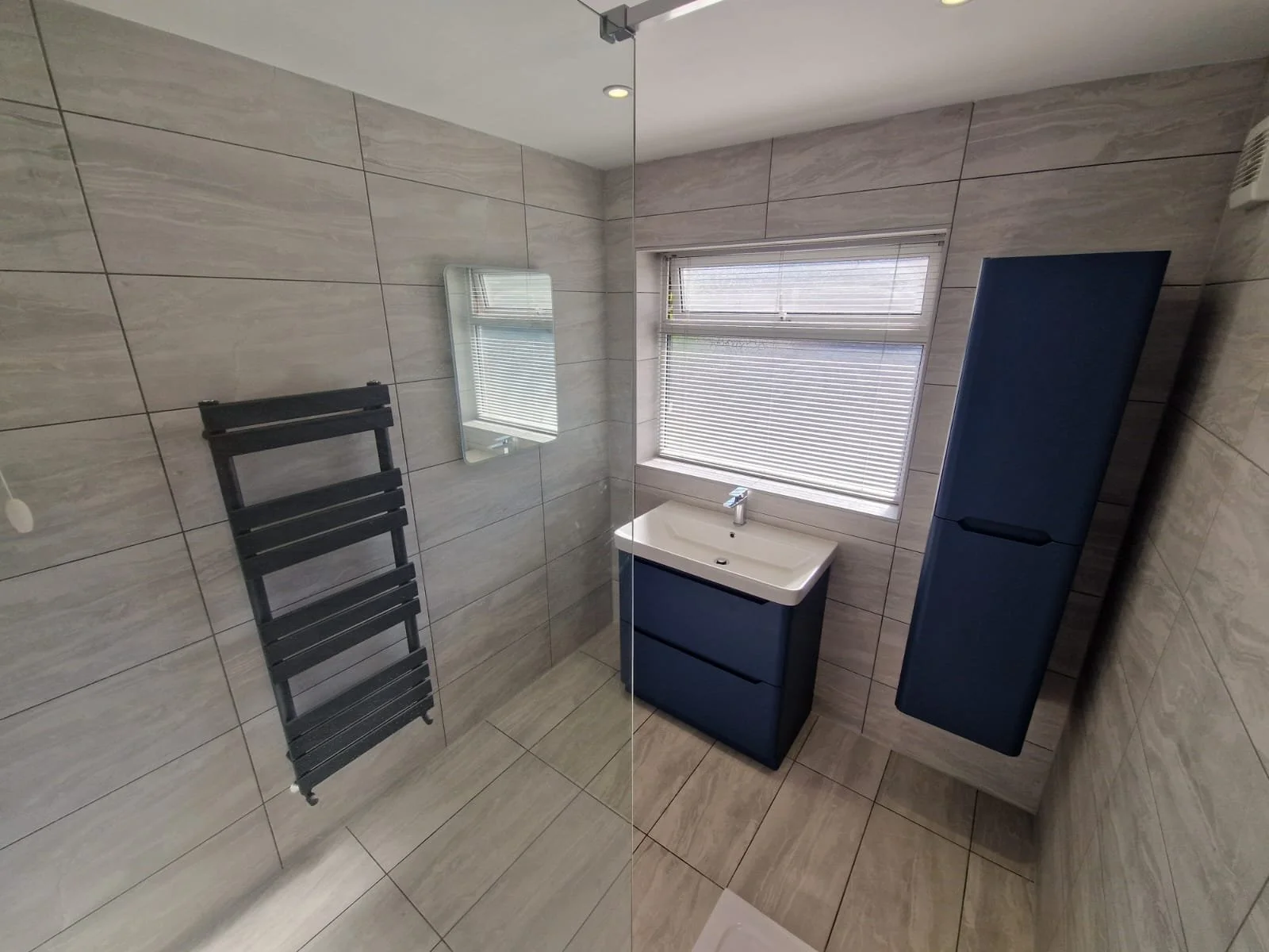 Low-maintenance open shower bathroom in Tamworth