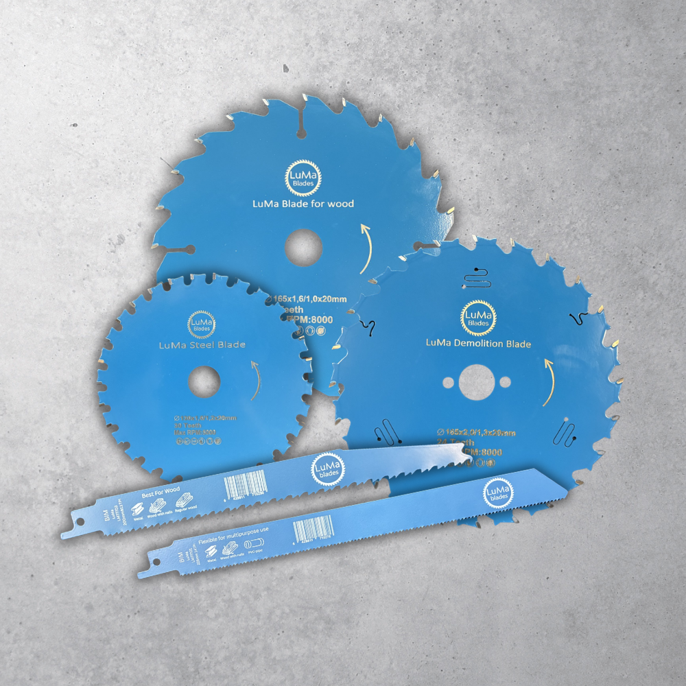 Blue multi-purpose hand saw with brand name LuMa blades, lying on a gray textured surface.