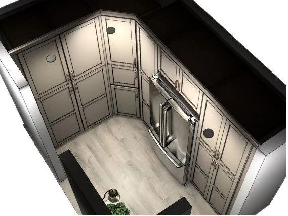 Top-down view of a modern kitchen with beige cabinets, stainless steel appliances, and light-colored hardwood flooring.