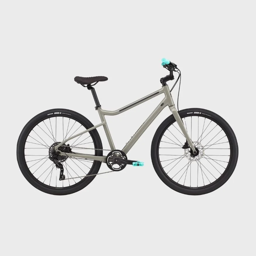 Gray mountain bike with black tires and a black saddle, featuring blue accents on the pedals and handlebar grips, set against a plain light gray background.