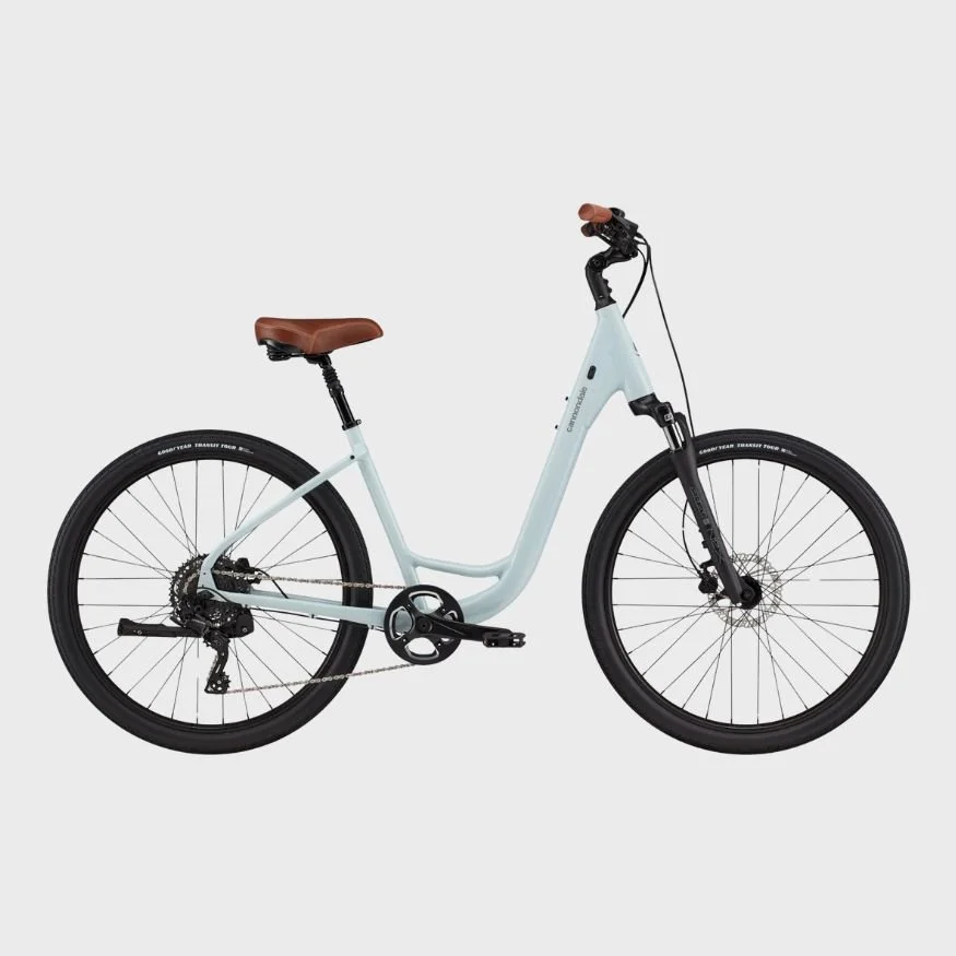 Light blue electric bicycle with a brown saddle and black handlebars, set against a plain white background.