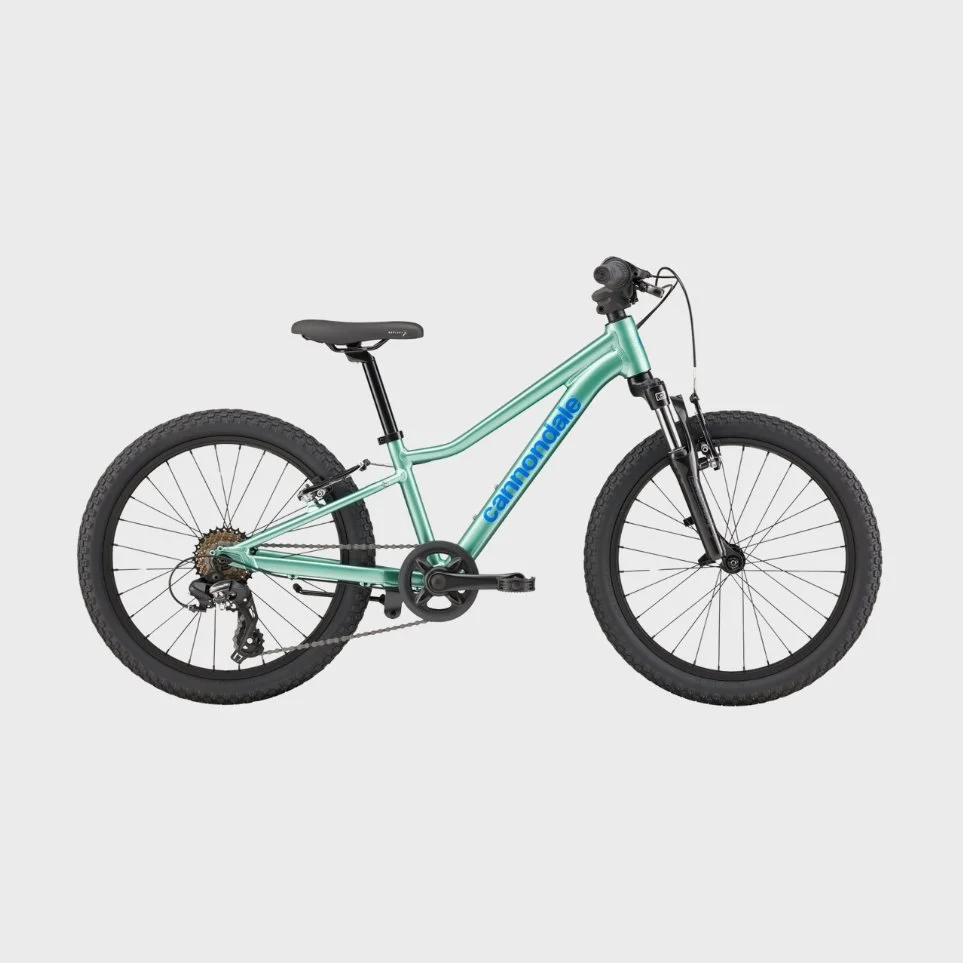 A teal Cannondale mountain bike with black tires, black seat, and front suspension, set against a plain light gray background.