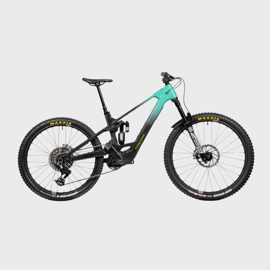Electric mountain bike with a black and teal frame, thick off-road tires, and front suspension, set against a plain white background.