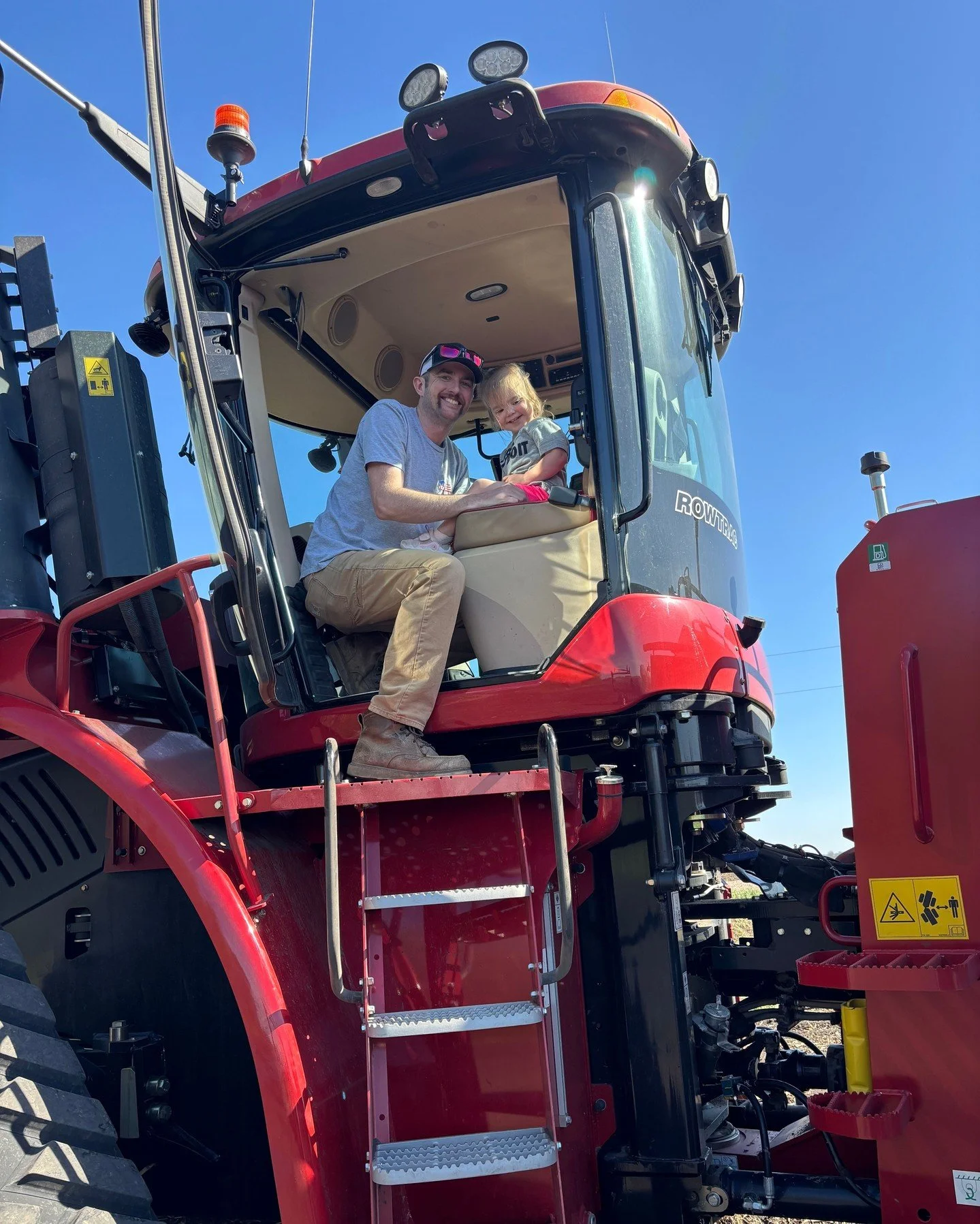 Planting season is busy, but there&rsquo;s always time to make memories with family! Logan, one of our crop employees, took his daughter and wife along for a tractor ride as they finished up the planting season. 
📸 Cheyanne V.

#allsmilesoverhere #p
