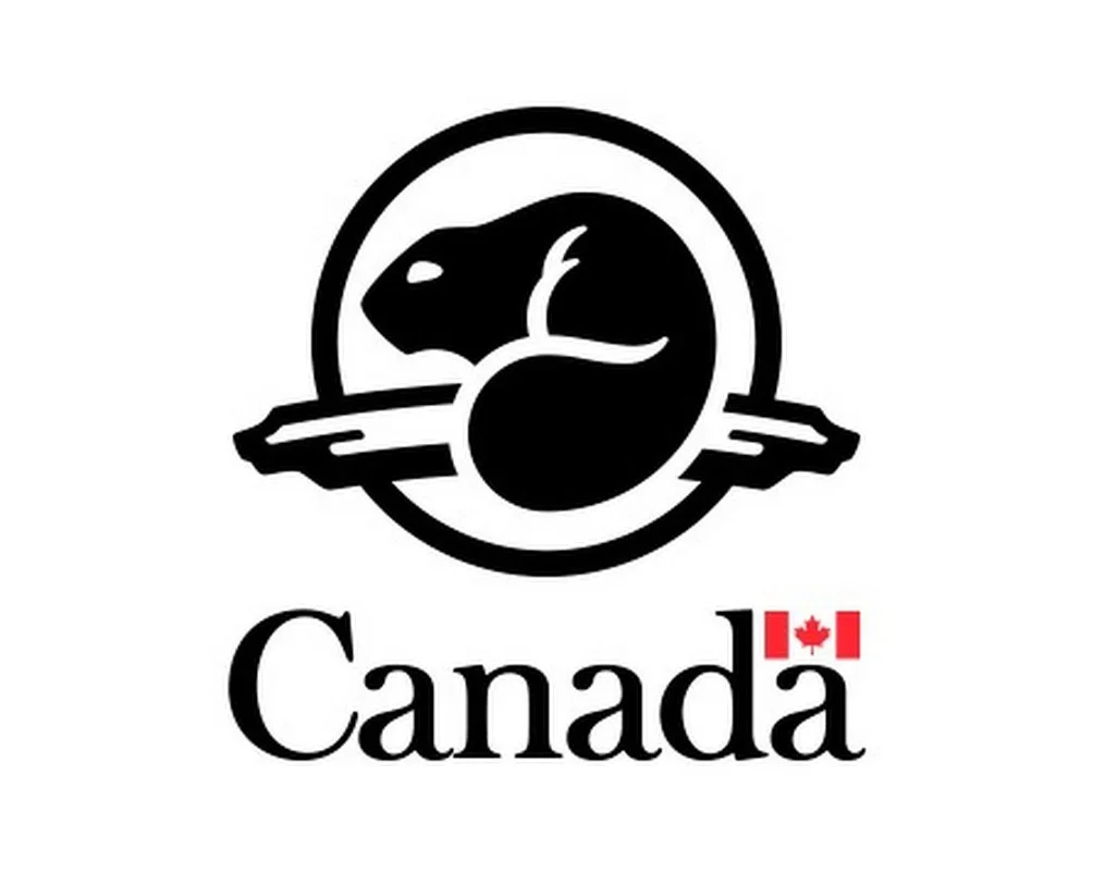 The logo of the Calgary Flames, a Canadian professional ice hockey team, features a black panther’s head in a circular emblem with a hockey stick, and the word "Canada" below, with a small red maple leaf above the letter "a".