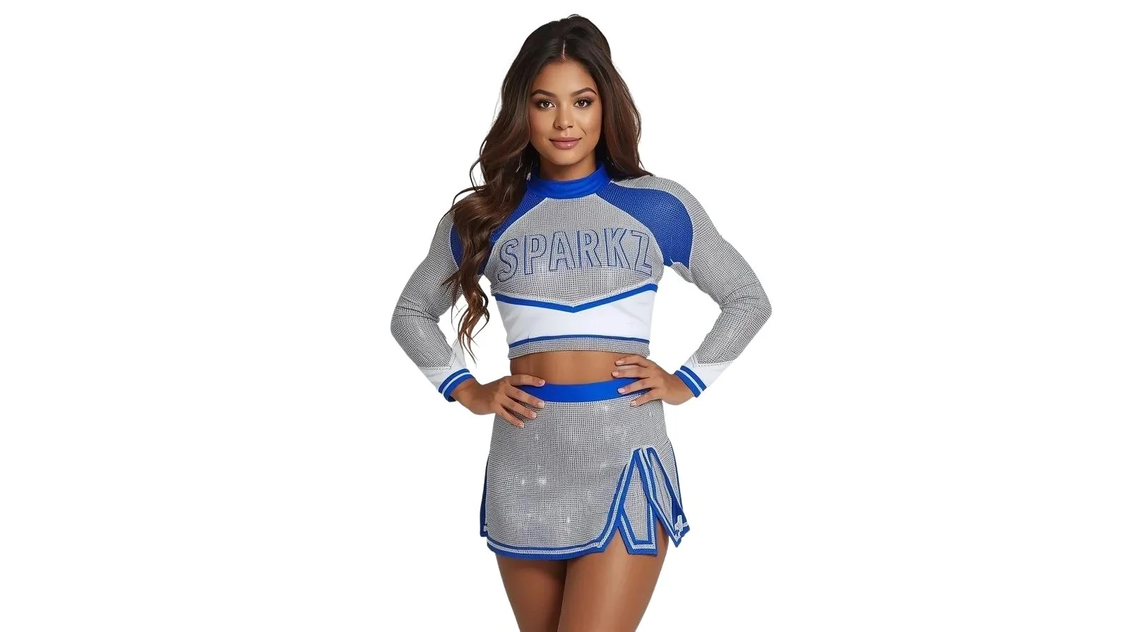 A young woman in a silver and blue cheerleading outfit standing with hands on hips, smiling, with a plain white background.