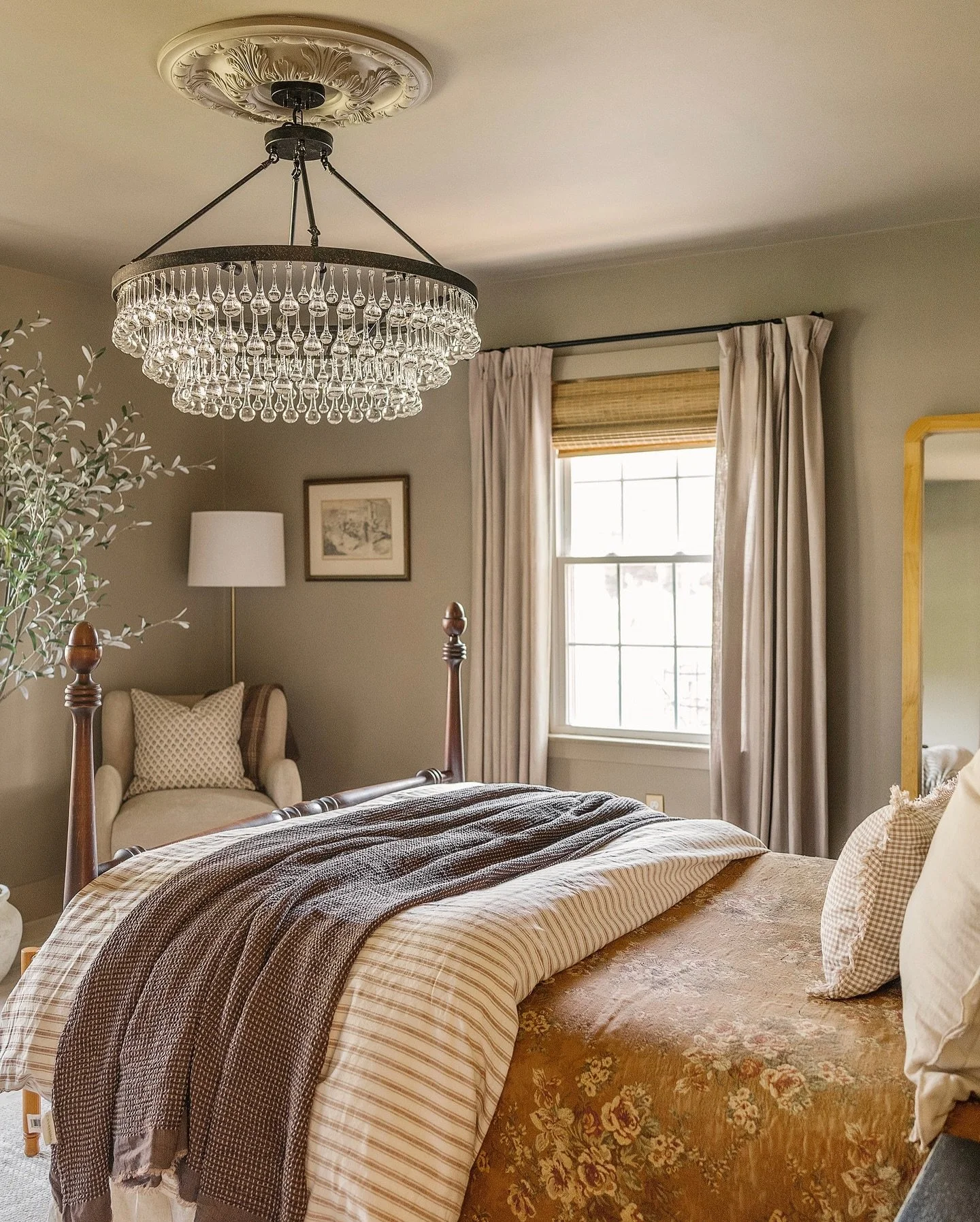 Let this be your sign to stop being afraid of moody paint colors, even in smaller rooms.

One of the biggest design myths is that darker colors make a space feel smaller. When you fully commit and take the color onto the ceiling, the room feels more 