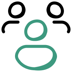 Modern house with wooden exterior and large glass window, set in a mountainous landscape with grassy foreground.