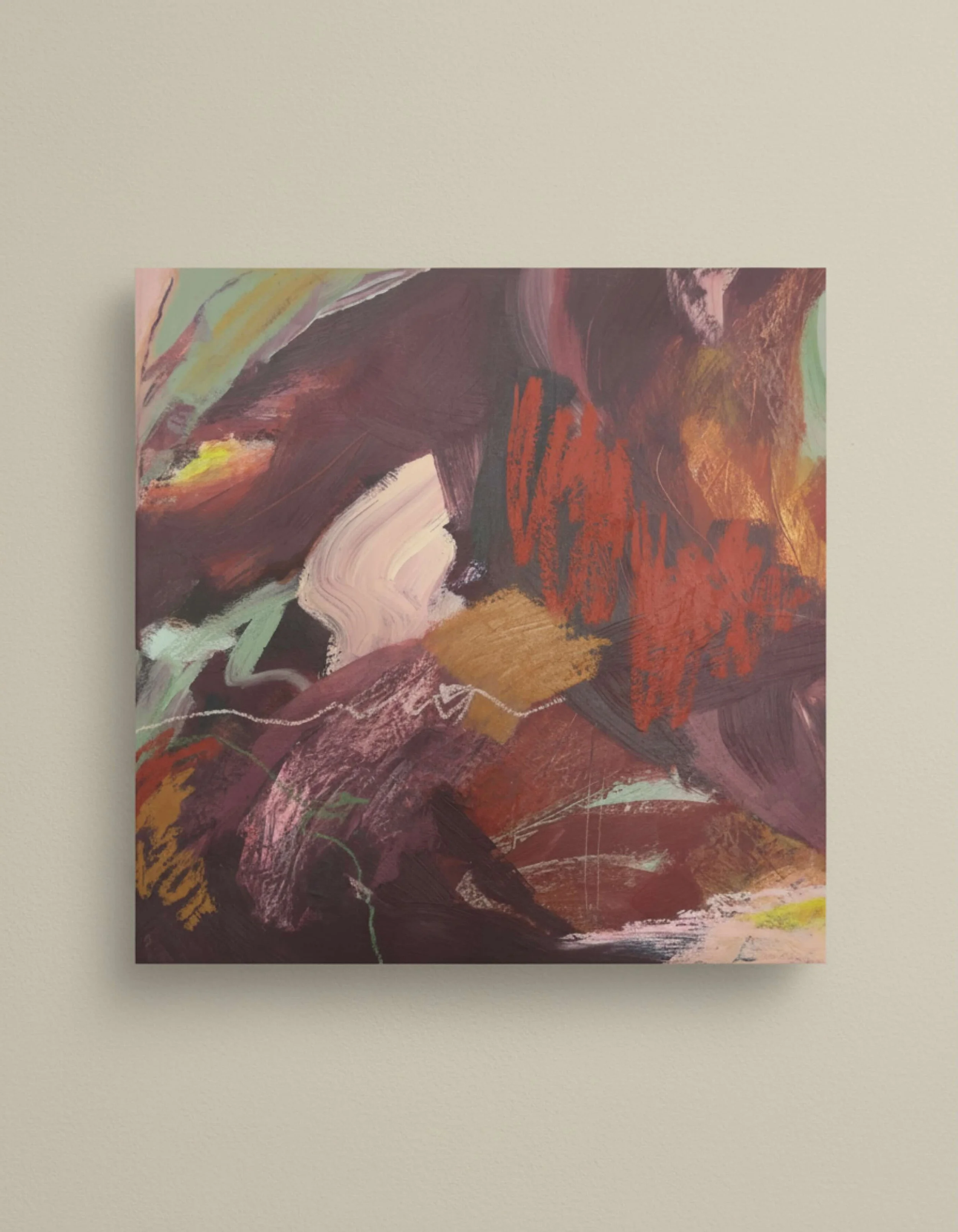 Abstract artwork with swirling brushstrokes in shades of red, purple, pink, brown, and hints of green and yellow, mounted on a light-colored wall.