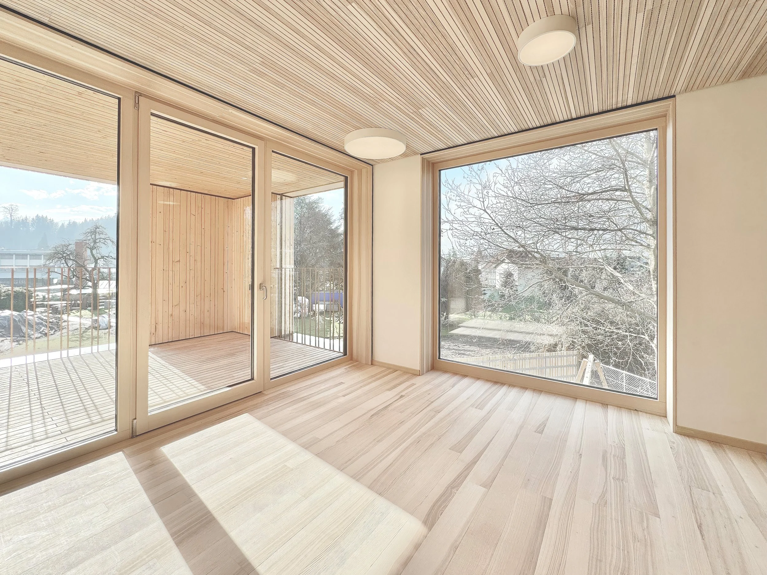 Kinderhaus Rankweil Markt | Gruppenraum Innen | Massivholz und Lehmwände schaffen ein gesundes und natürliches Raumklima