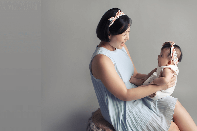 Mayvina Wee, founder of Manna Milk Lactation, welcoming families to her breastfeeding support space in Singapore.