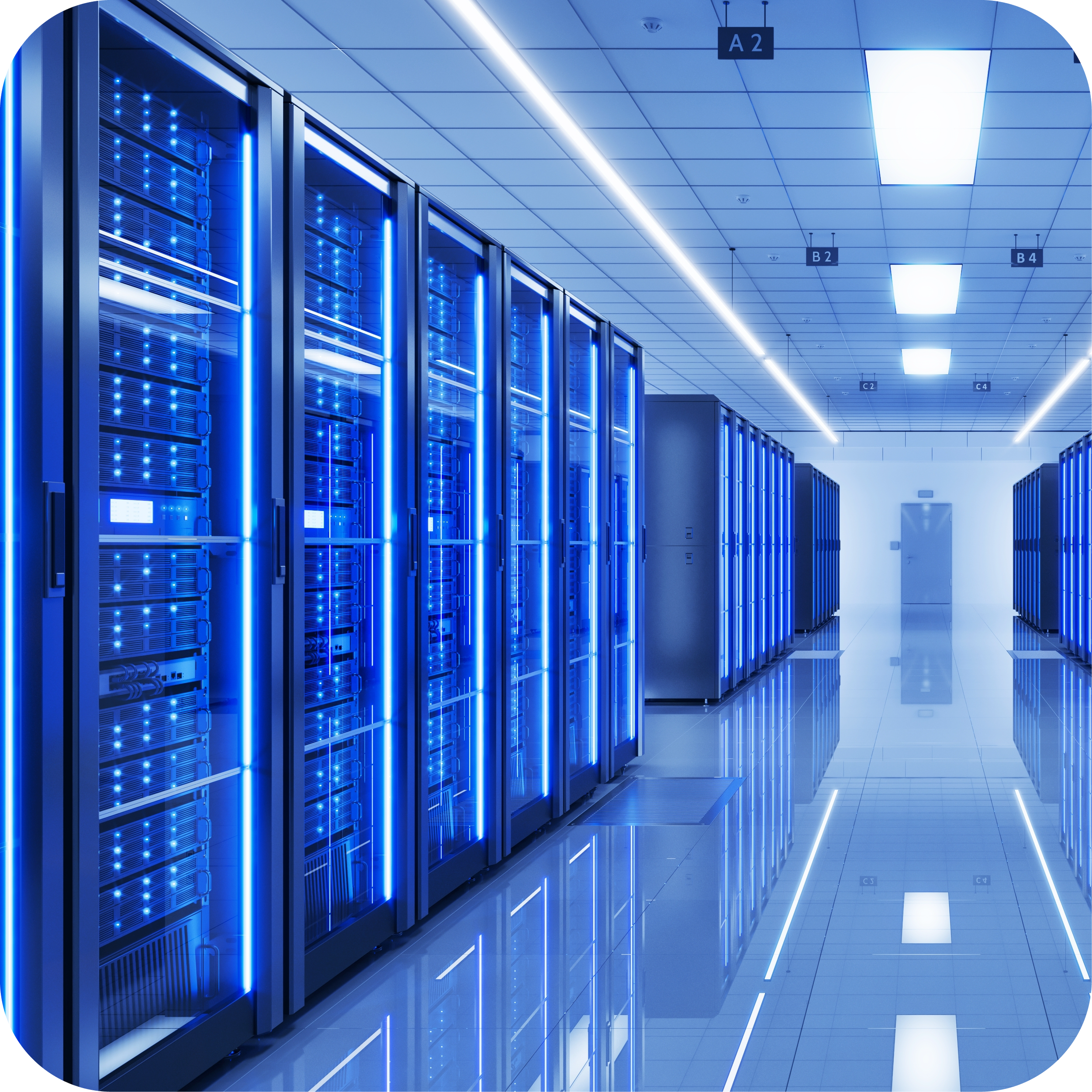 A modern data center with rows of blue-lit server racks and reflective tiled floors.