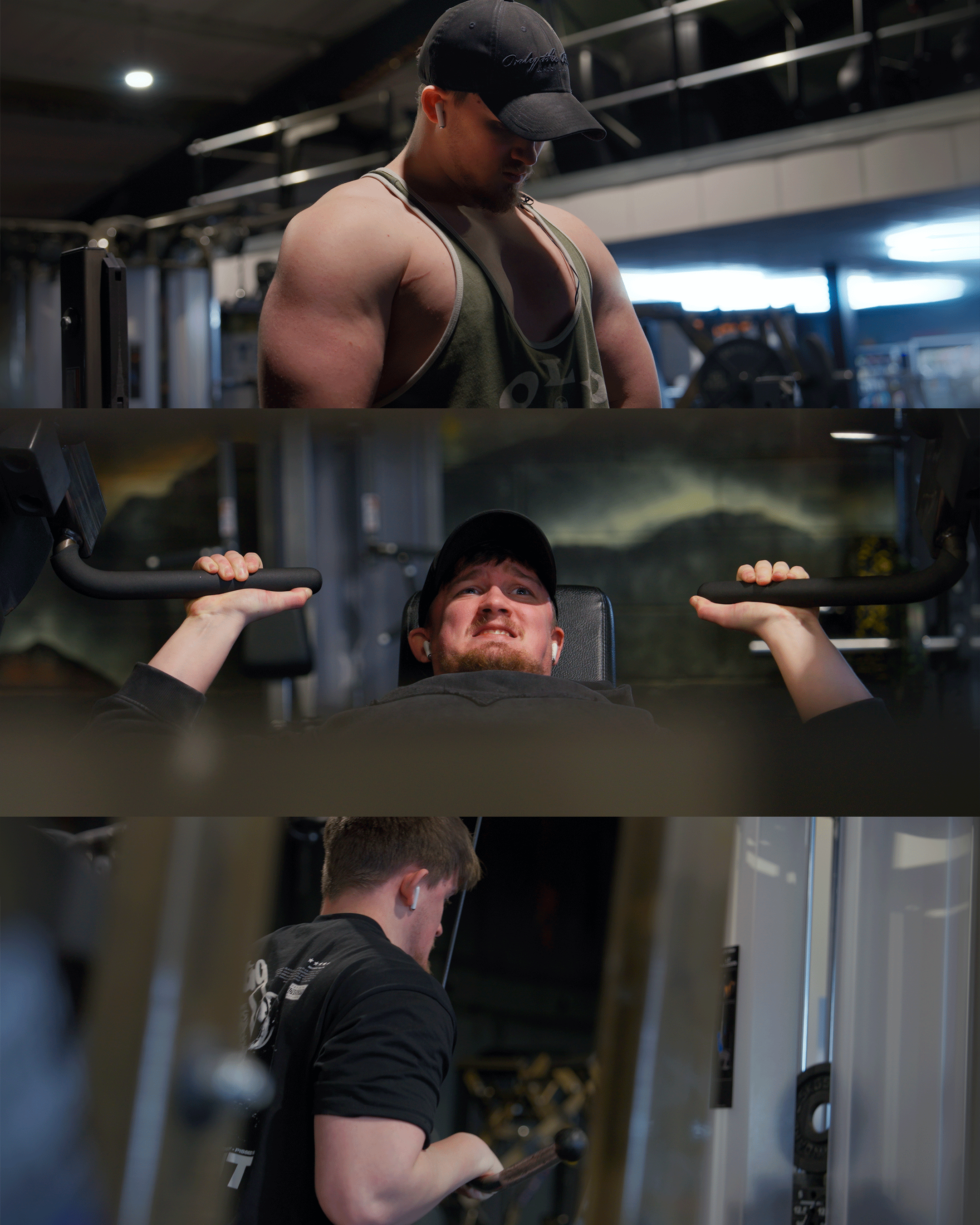 Three men working out in a gym: a muscular man with a cap looking down, a man lying on a bench pressing weights, and a young man with earbuds reading a guide or phone.