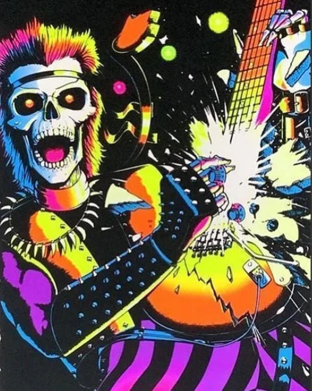 My first guitar hero.

(a UV-reactive poster my oldest brother gifted me when I was a little kid)