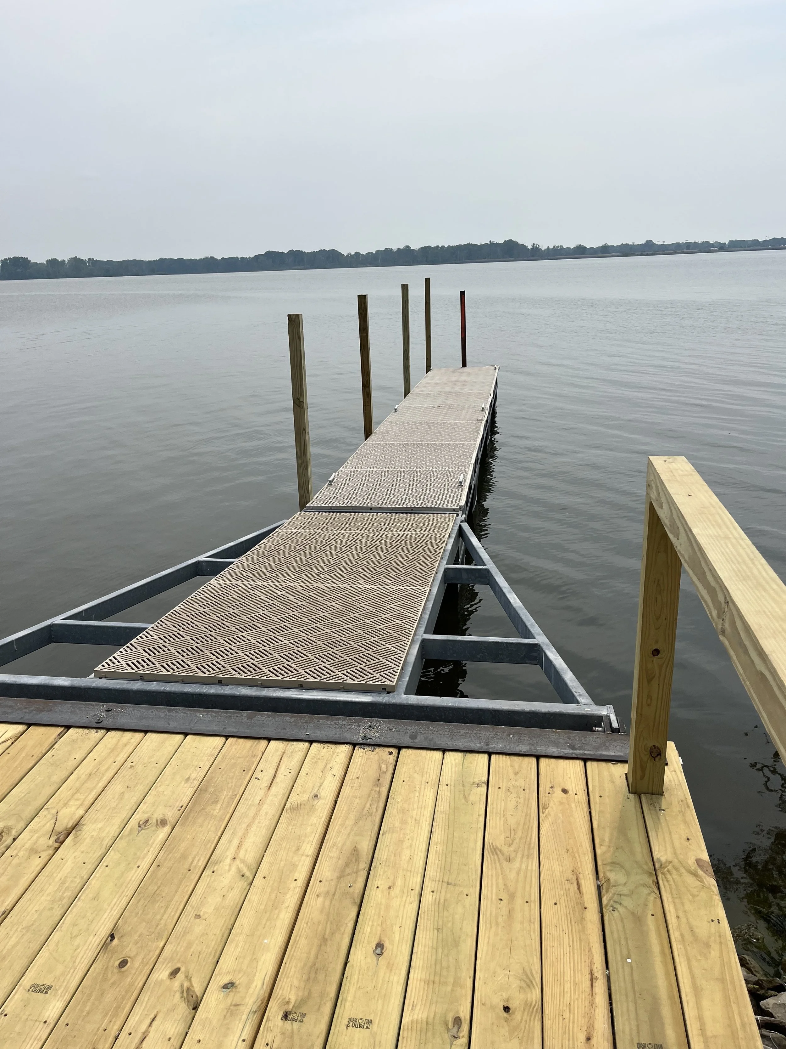 A custom-built dock for a residential home in Sandusky Ohio by Pipe Creek Enterprises