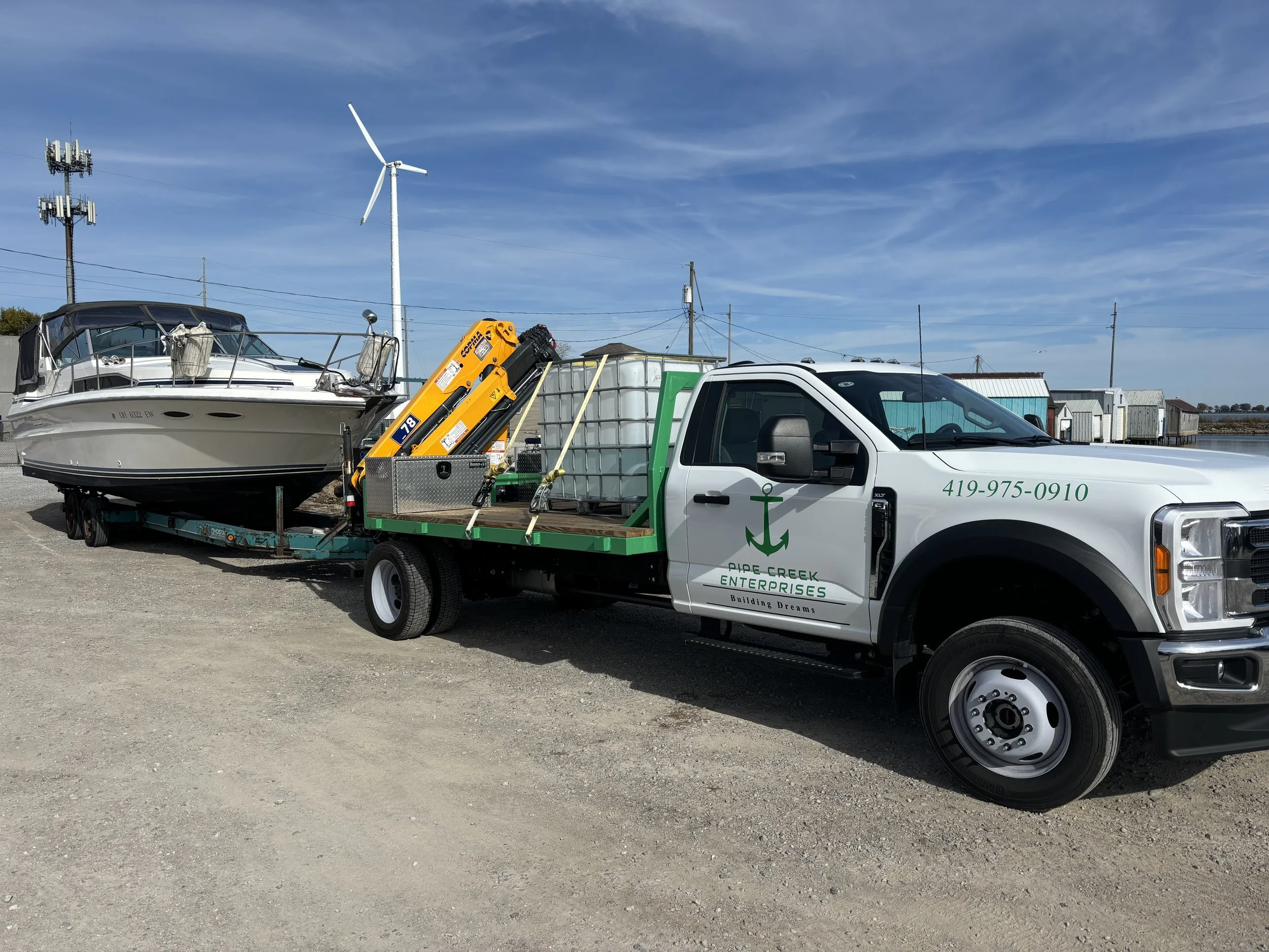 Pipe Creek Enterprises hauling a boat to be launched in the spring in Sandusky Ohio