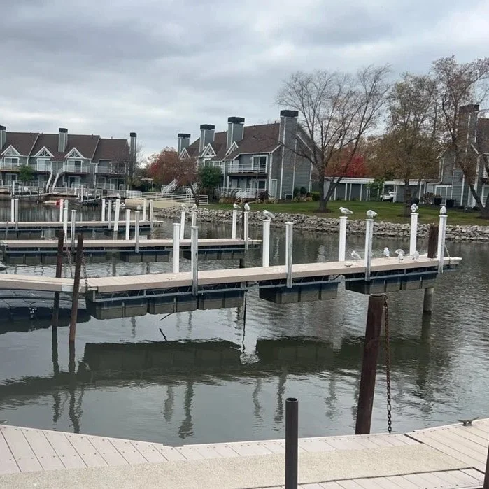 Winter services of docks being lifted for the winter by Pipe Creek Enterprises 