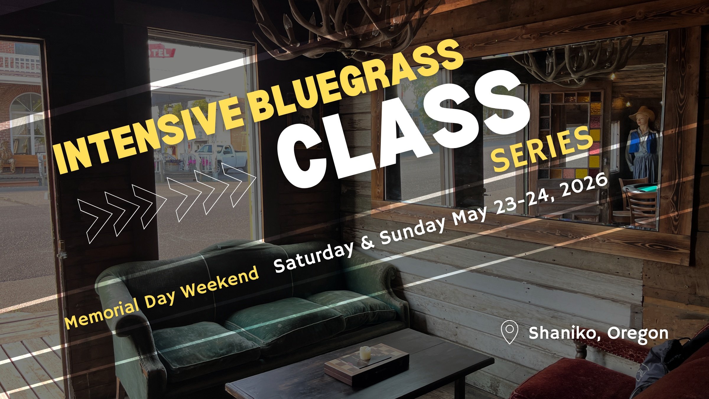 A wooden interior with a green sofa, a black coffee table with a candle, and a mirror reflecting a mannequin in traditional clothing inside a rustic shop. Outside the window, a street scene with vintage buildings and parked cars is visible.