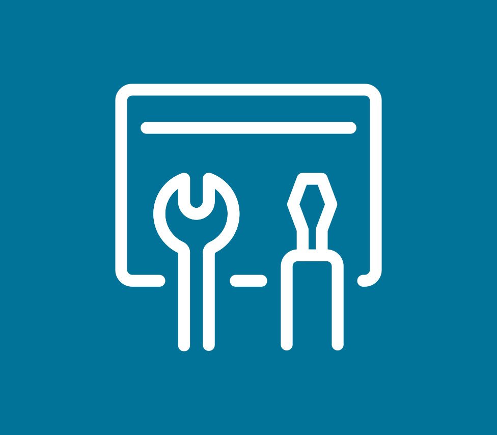 Icon of a screwdriver and wrench crossed over each other on a brown background.