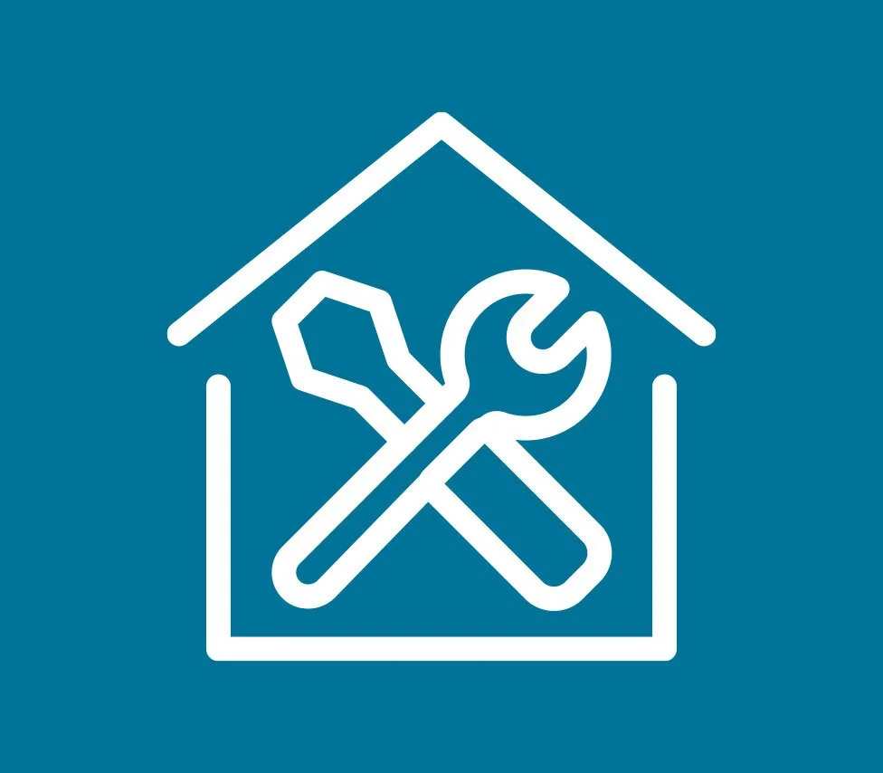 Icon of a wrench and a building with AR arches on the front, representing maintenance or technical support.
