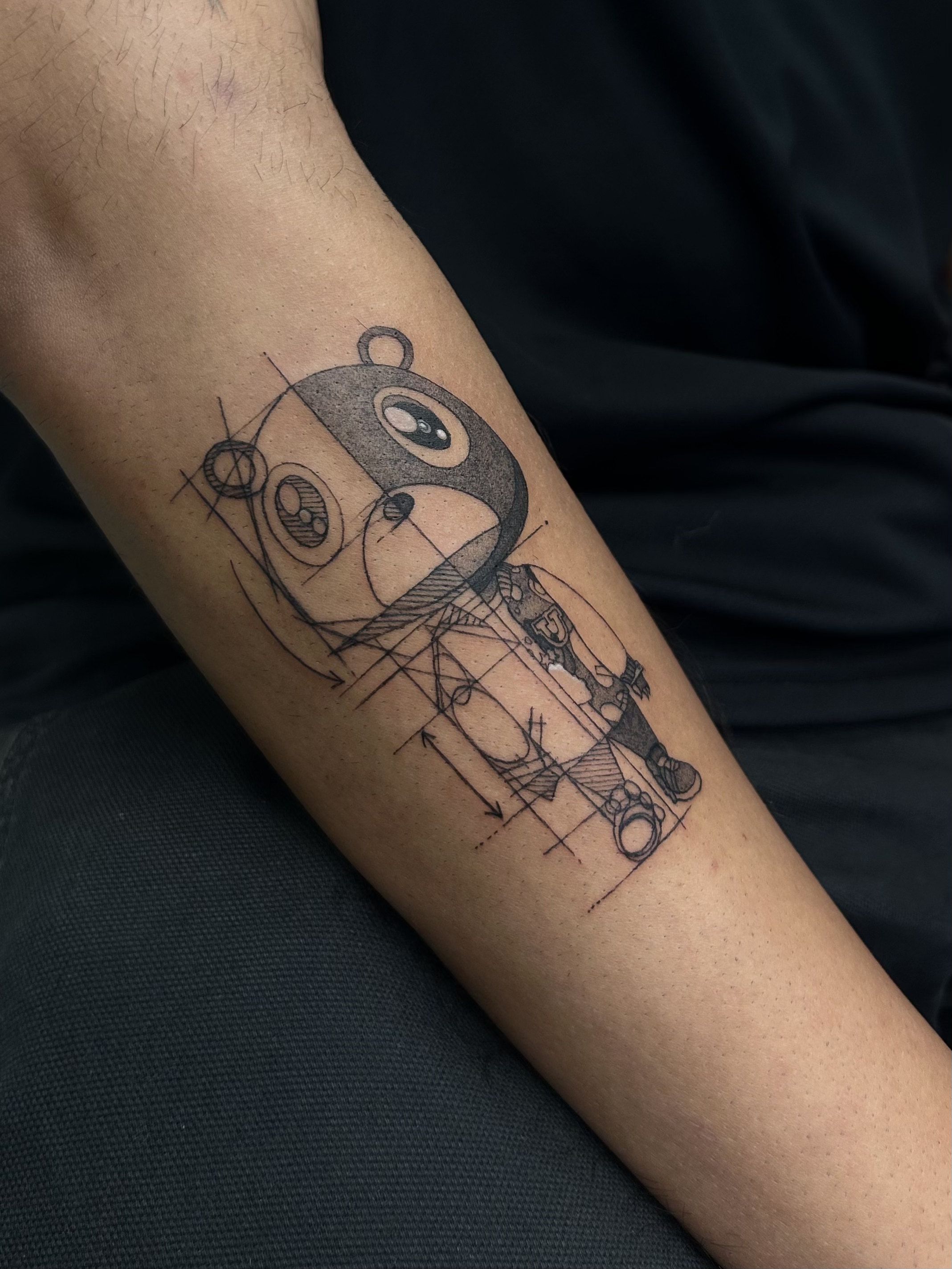 Sketch-style tattoo of the Kanye West "graduation" bear. album cover. Kanye West tattoo