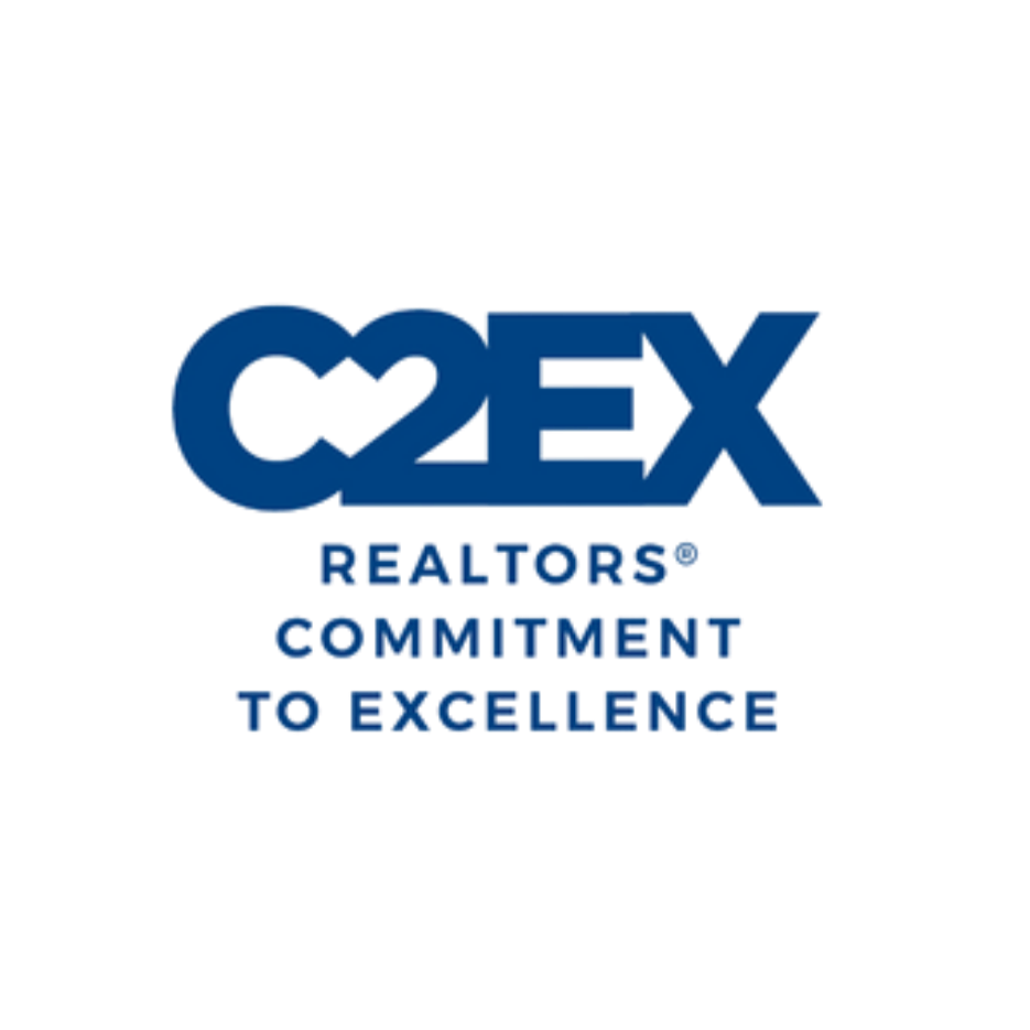 Cox logo with the words 'Realtors', 'Commitment', and 'To Excellence' underneath.