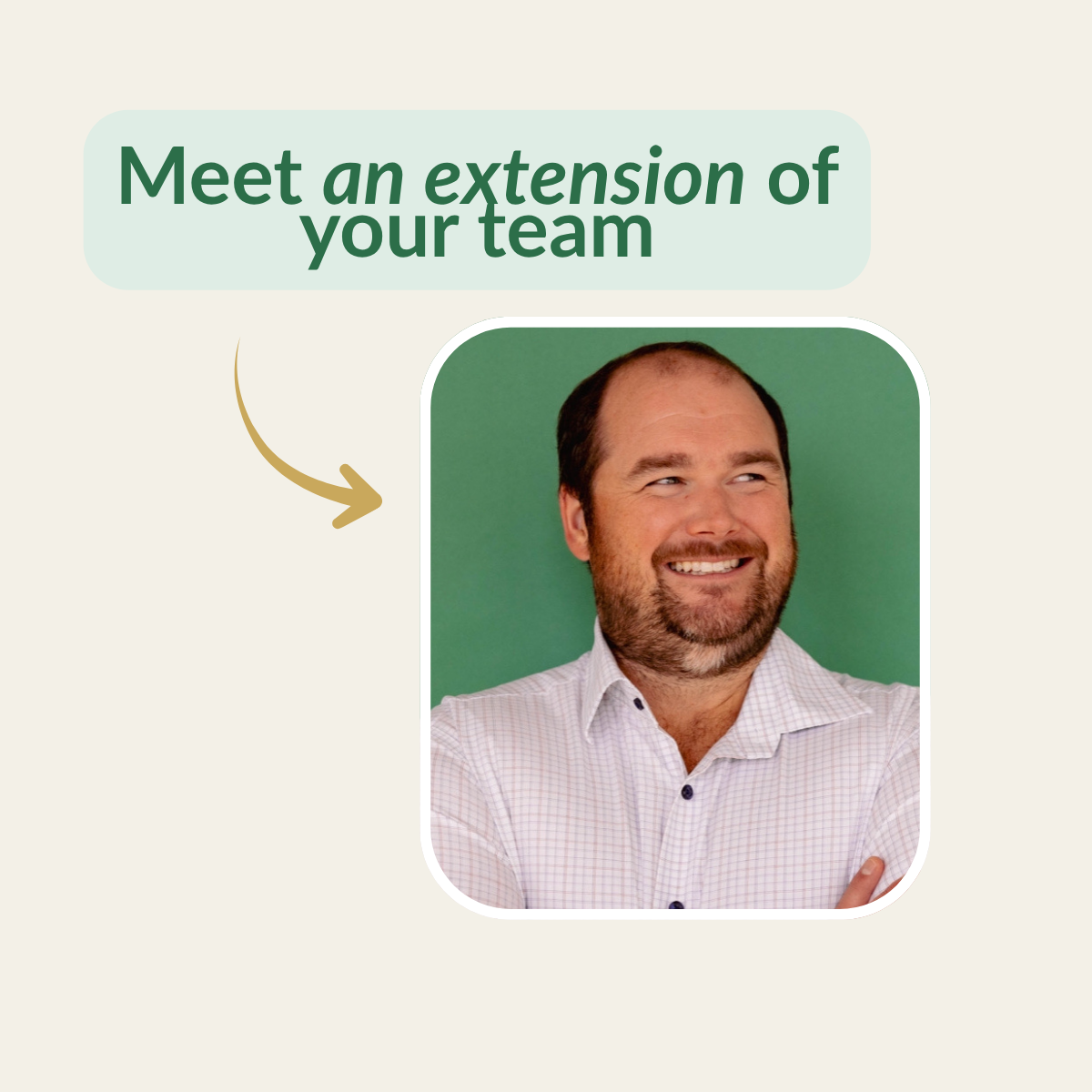 A smiling man with a beard and short dark hair, wearing a light-colored checkered shirt, standing against a green background.