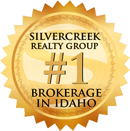 Gold seal with black text stating Silvercreek Realty Group #1 Brokerage in Idaho.