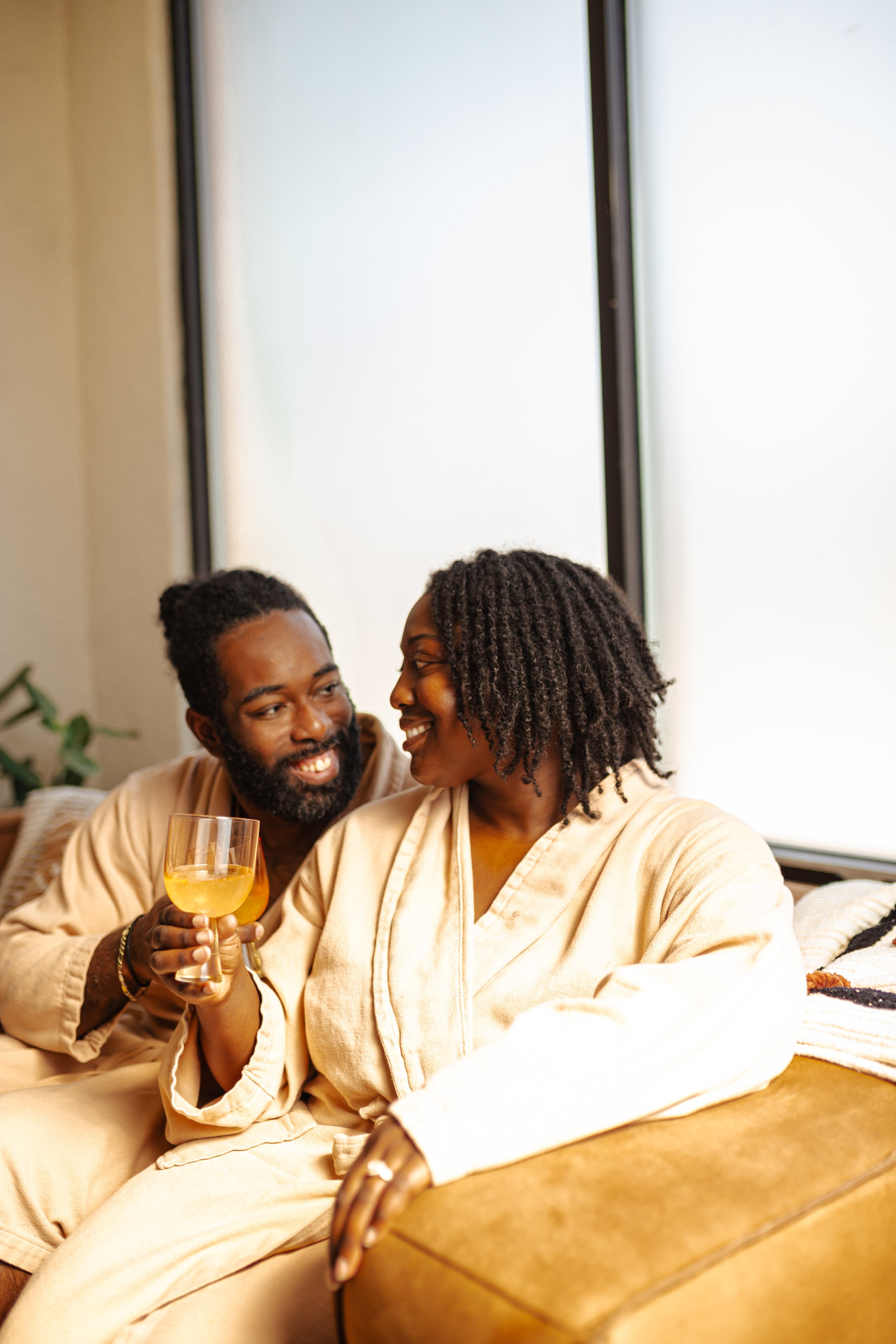 Couple relaxing in spa robes after a massage experience in Oklahoma City