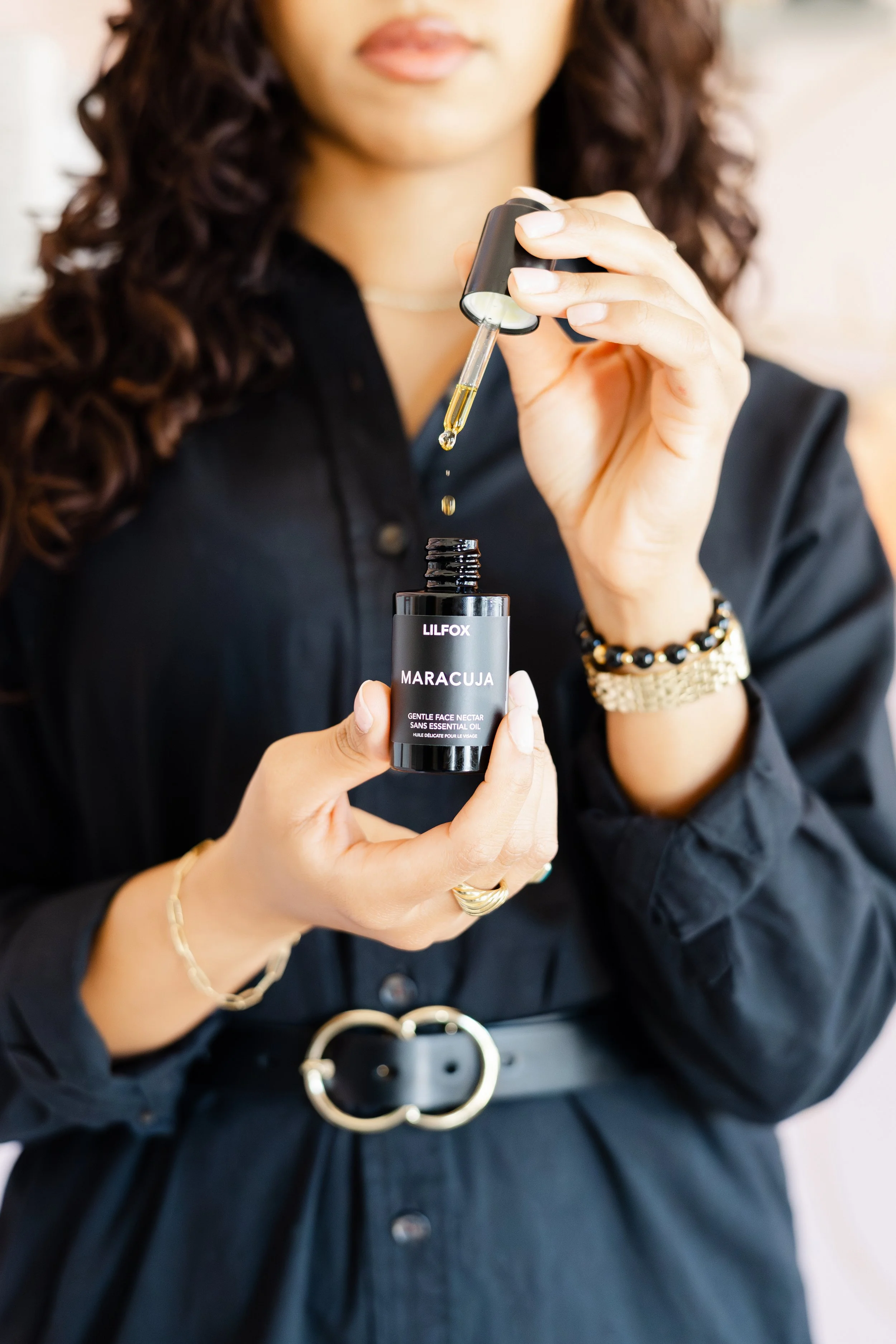 woman holding skincare product, skincare professionals in tampa