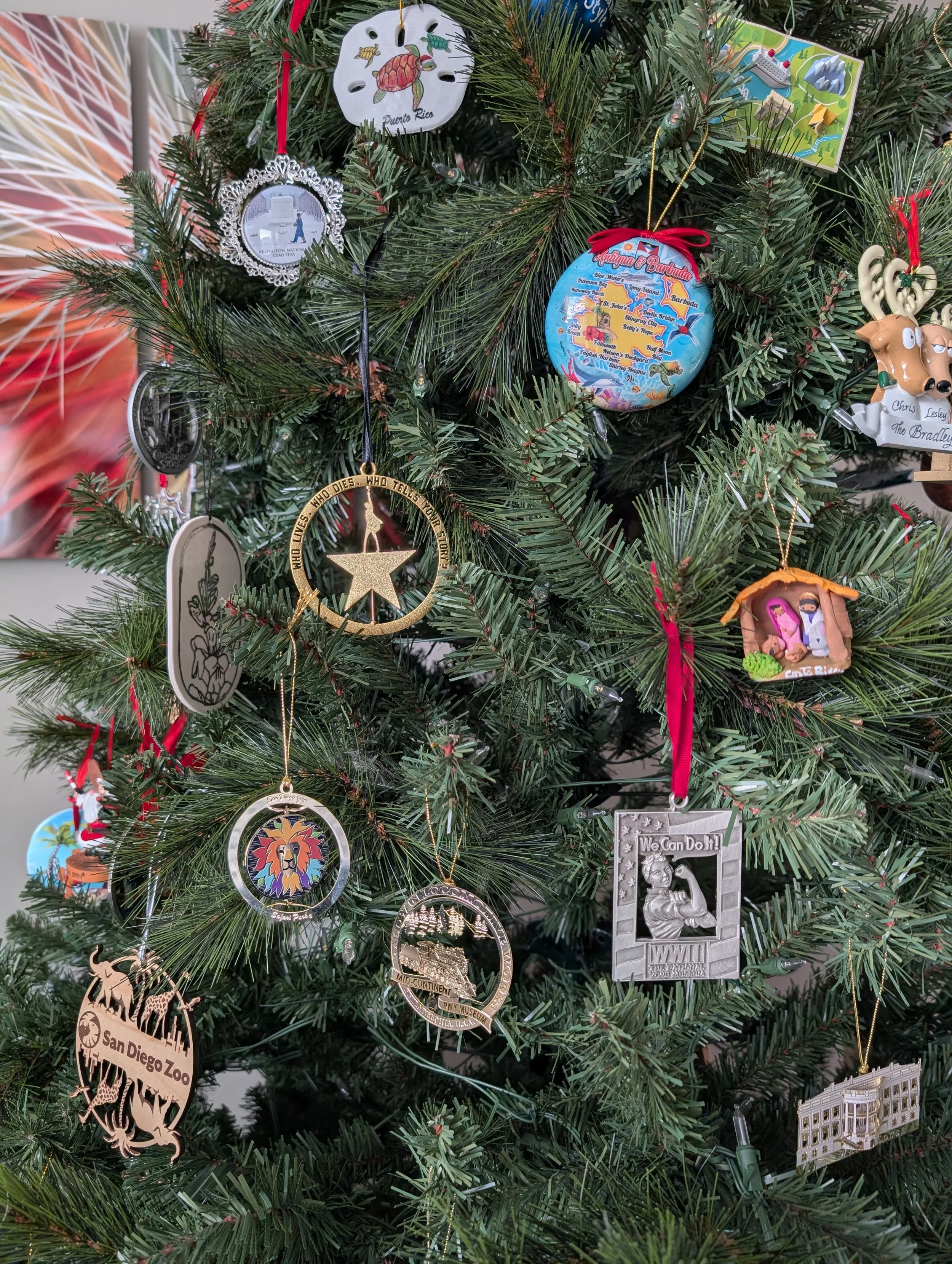 Christmas tree decorated with ornaments collected from past travels