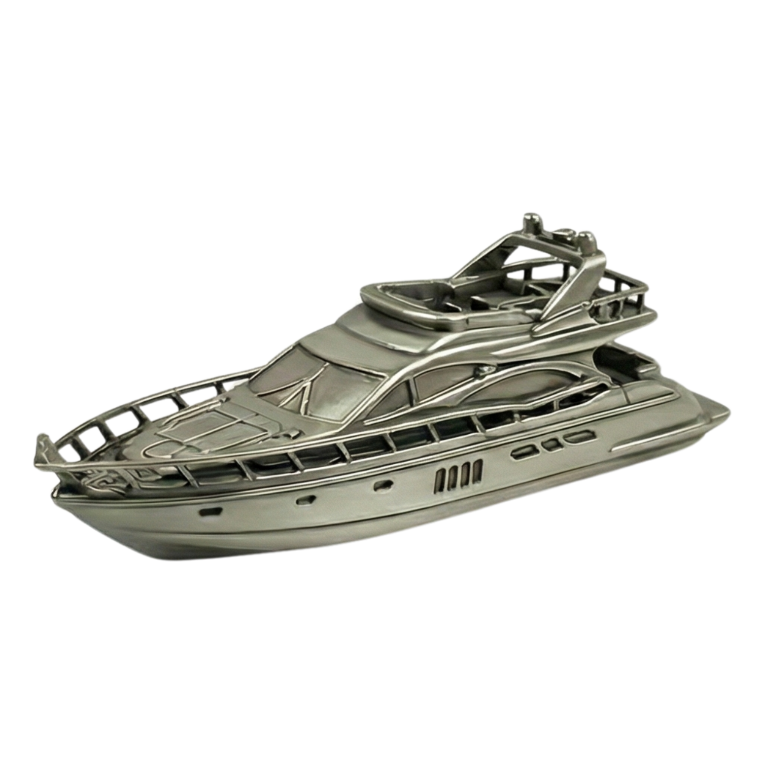 A metallic yacht-shaped decorative object with detailed design elements.